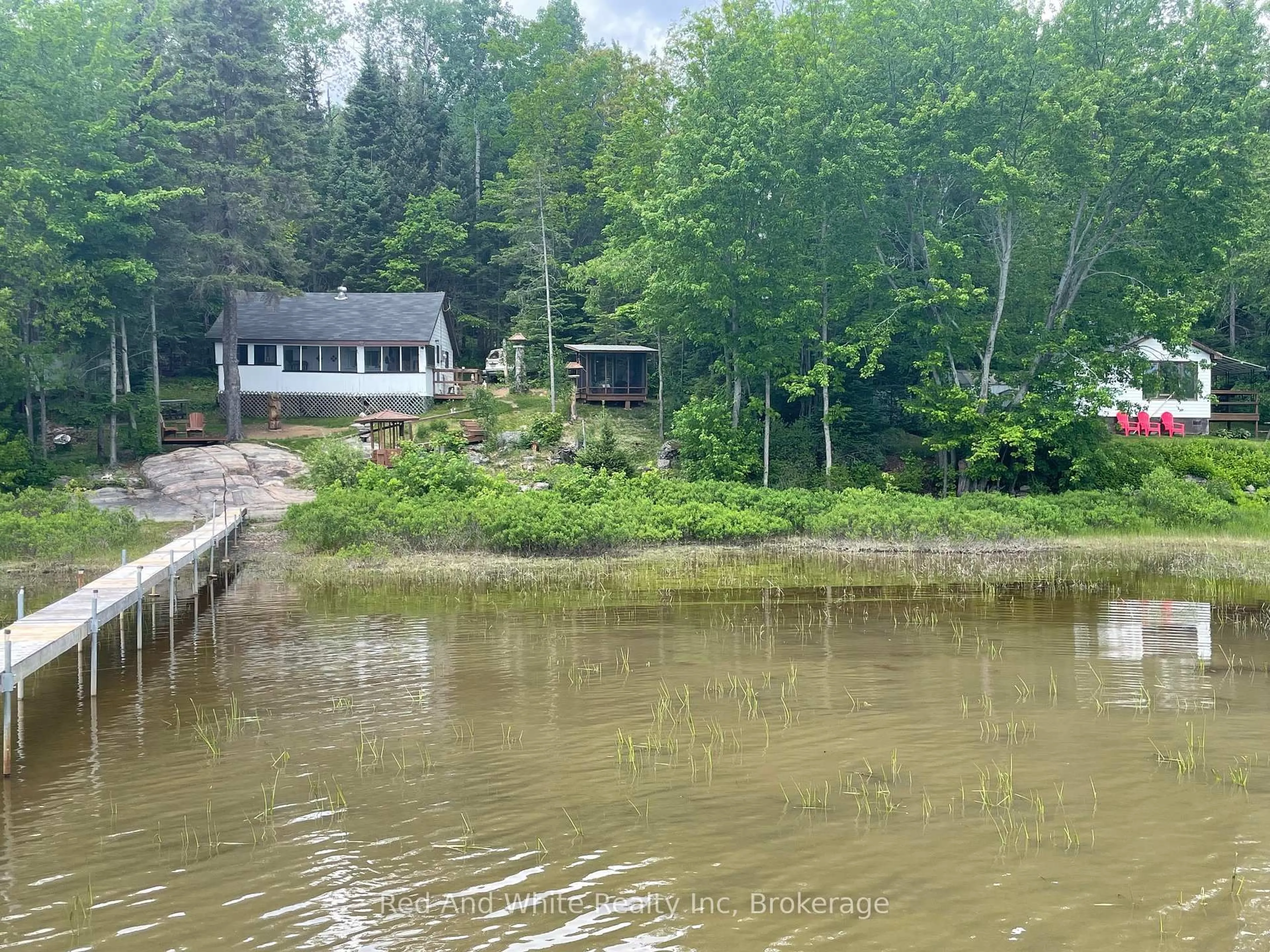 A pic from outside/outdoor area/front of a property/back of a property/a pic from drone, water/lake/river/ocean view for 53 COTTAGE Crt, Burk's Falls Ontario P0A 1C0