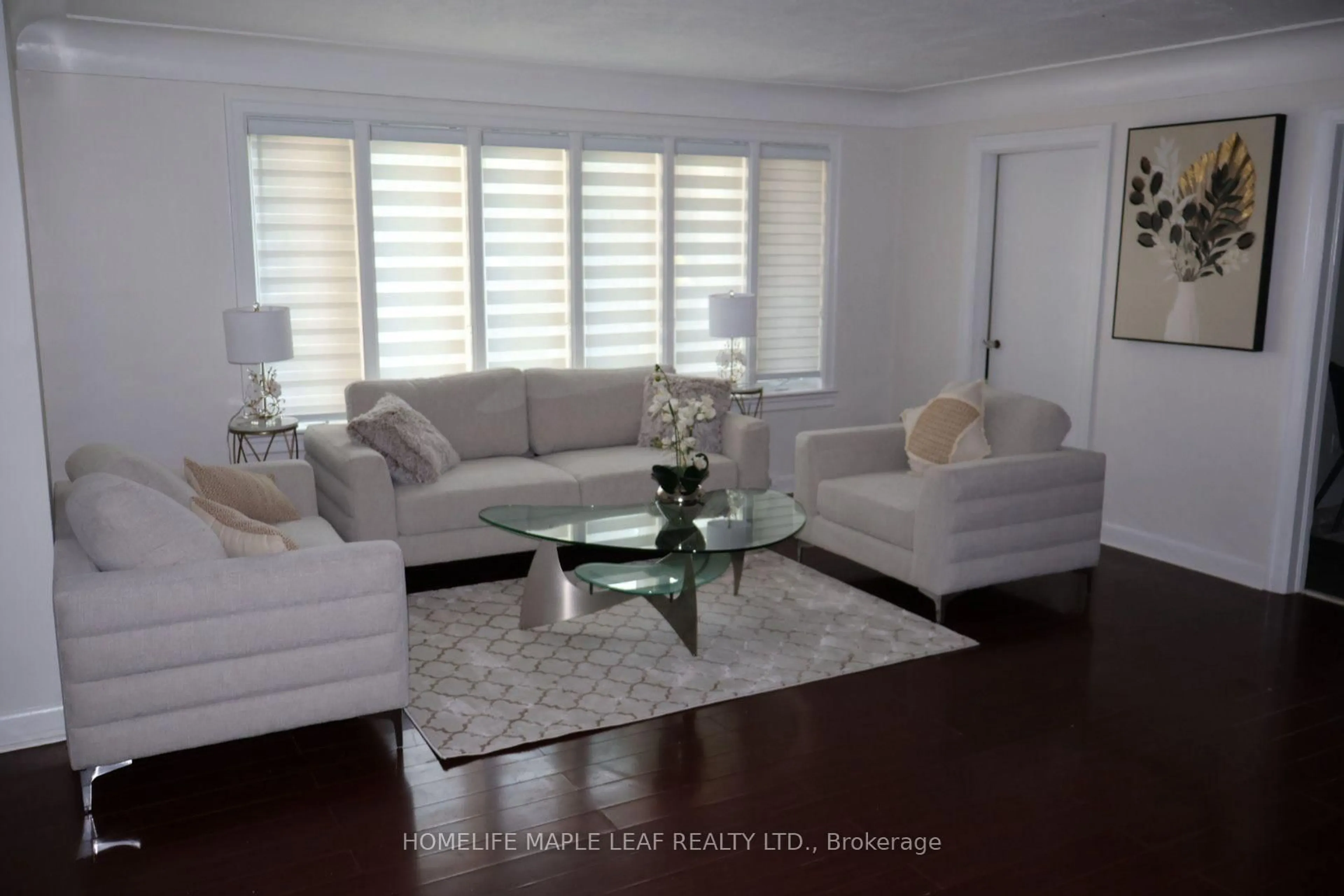 Living room with furniture, wood/laminate floor for 617 Lock St, Haldimand Ontario N1A 1V9