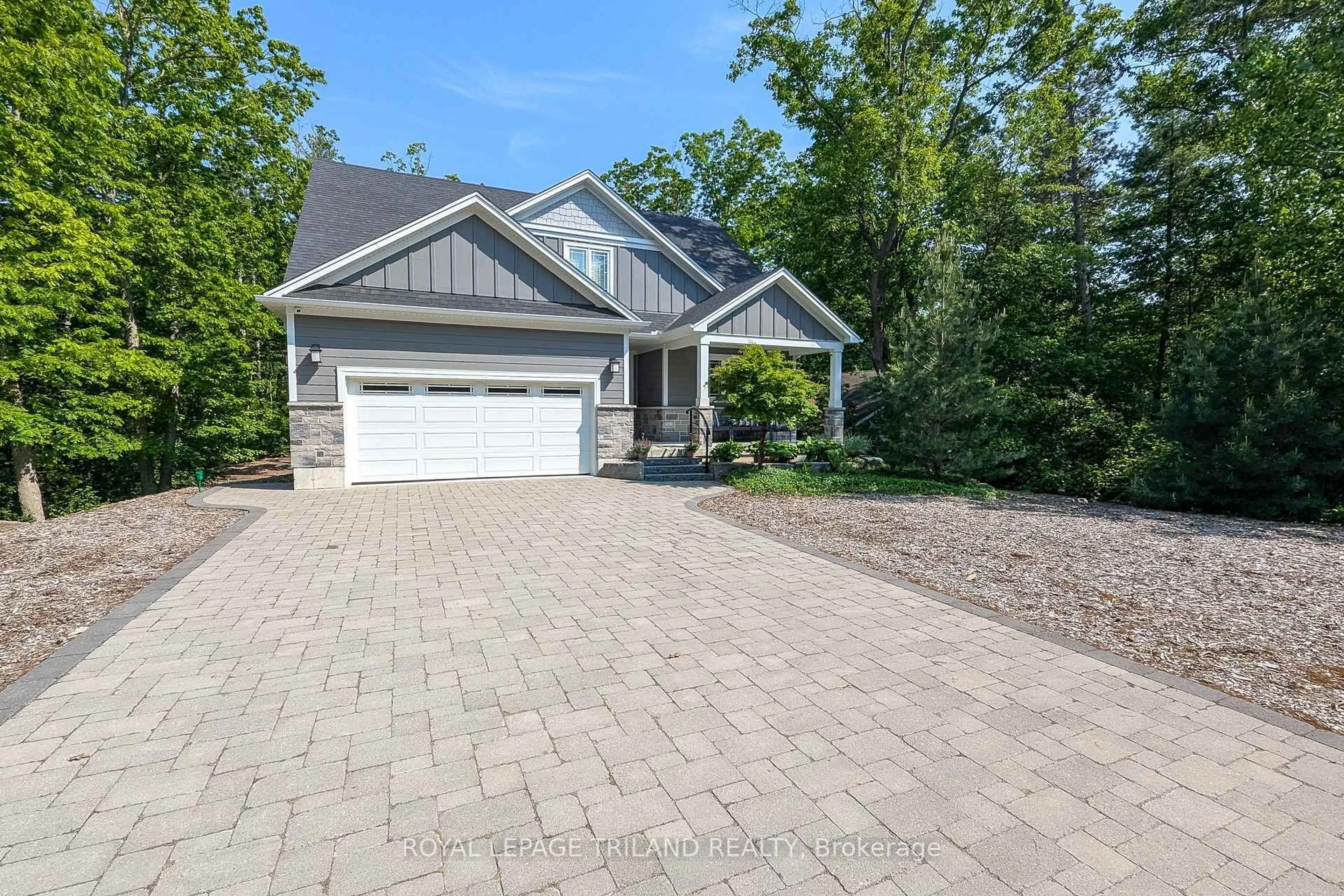 Home with brick exterior material, street for 10124 SANDALWOOD Cres, Lambton Shores Ontario N0M 1T0
