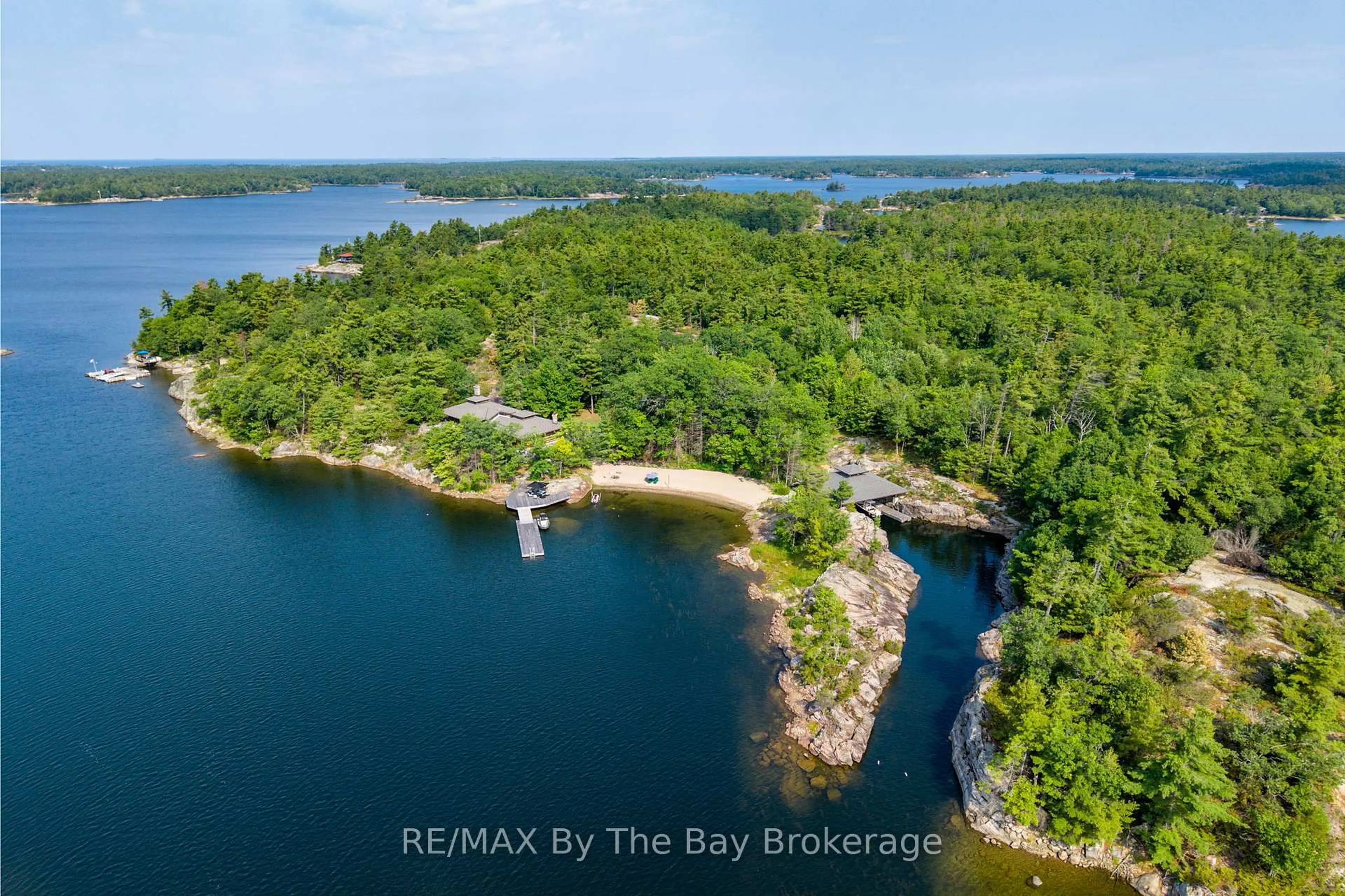 A pic from outside/outdoor area/front of a property/back of a property/a pic from drone, water/lake/river/ocean view for 1216 Island 2060/Big Ship Island, Georgian Bay Ontario P0E 1E0