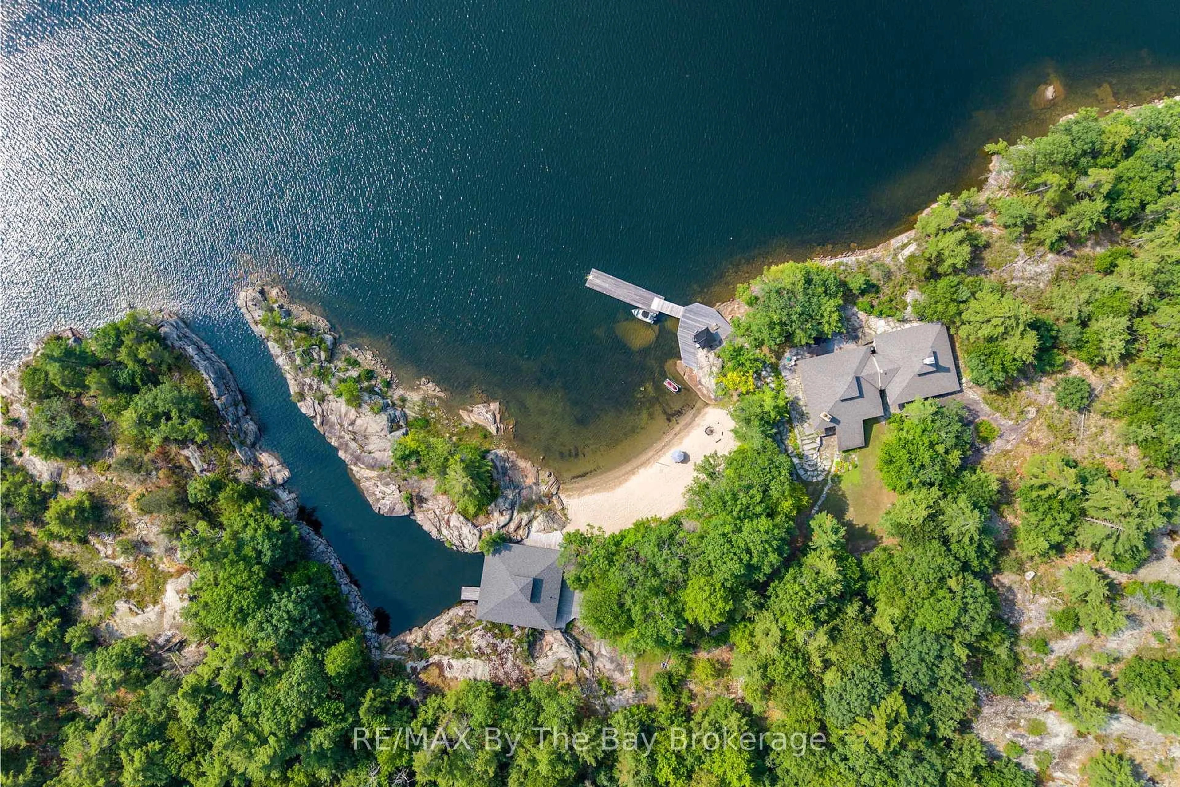 A pic from outside/outdoor area/front of a property/back of a property/a pic from drone, water/lake/river/ocean view for 1216 Island 2060/Big Ship Island, Georgian Bay Ontario P0E 1E0
