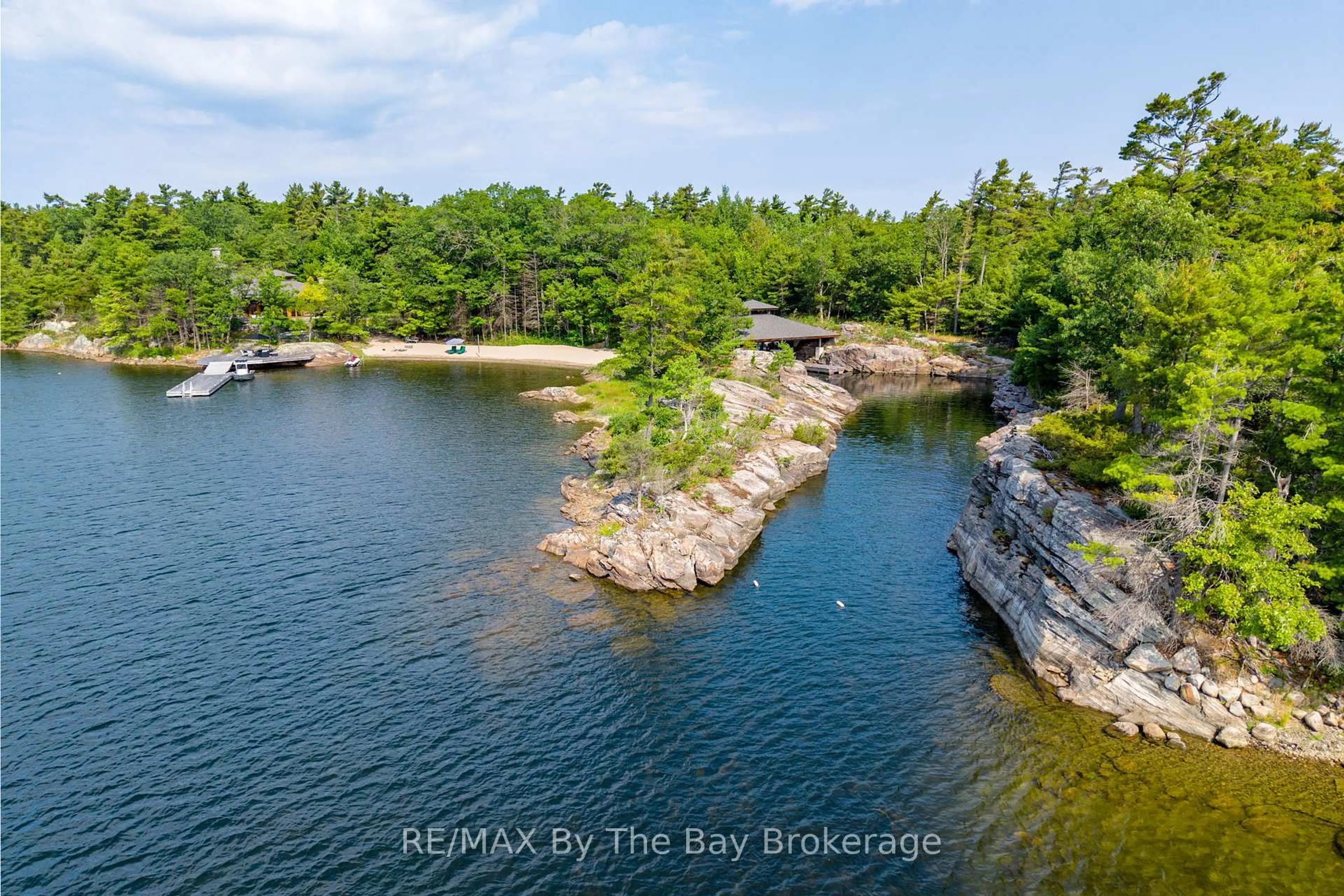 A pic from outside/outdoor area/front of a property/back of a property/a pic from drone, water/lake/river/ocean view for 1216 Island 2060/Big Ship Island, Georgian Bay Ontario P0E 1E0
