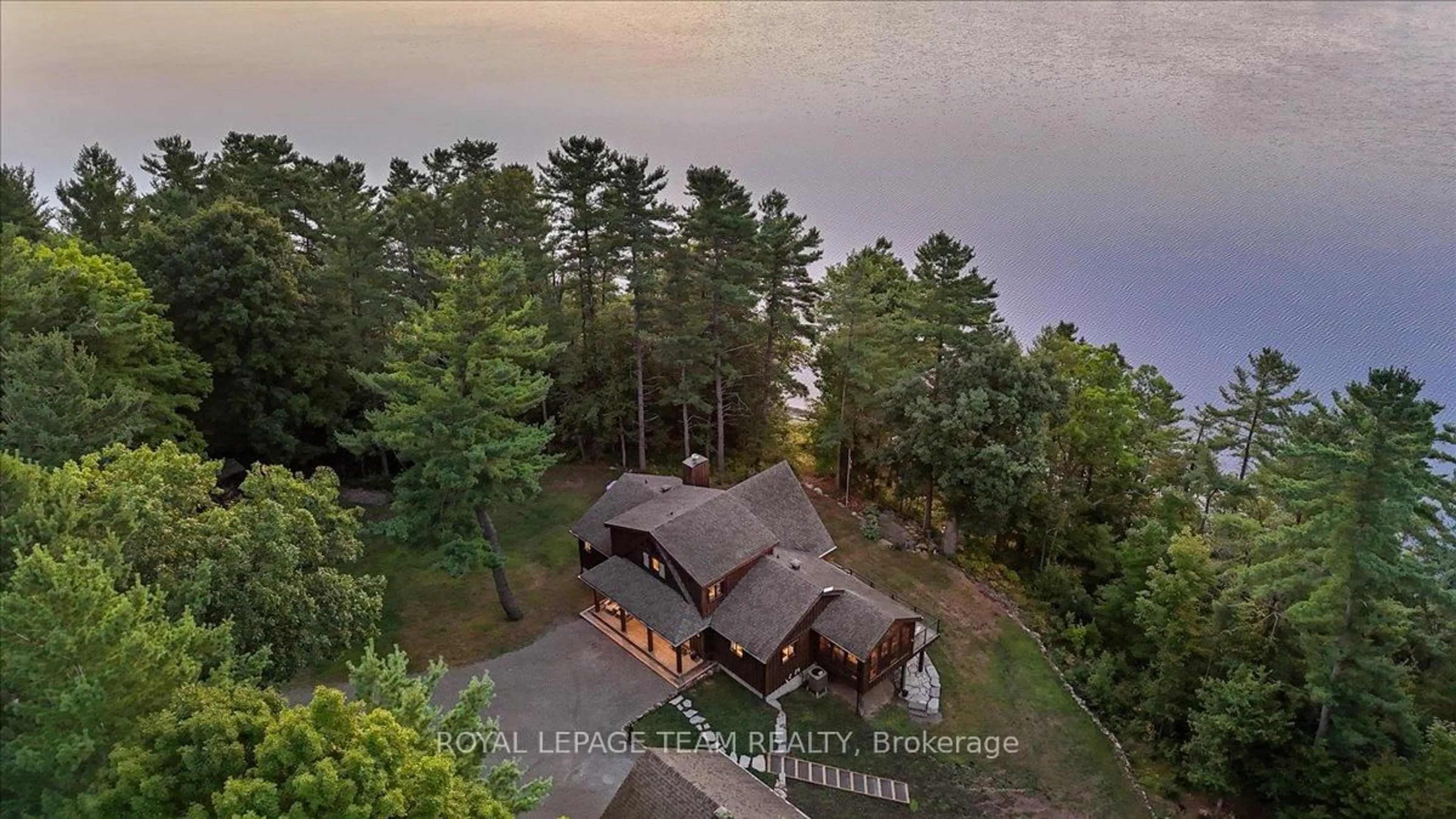 A pic from outside/outdoor area/front of a property/back of a property/a pic from drone, water/lake/river/ocean view for 884 Anderson Rd, Tichborne Ontario K0H 2V0