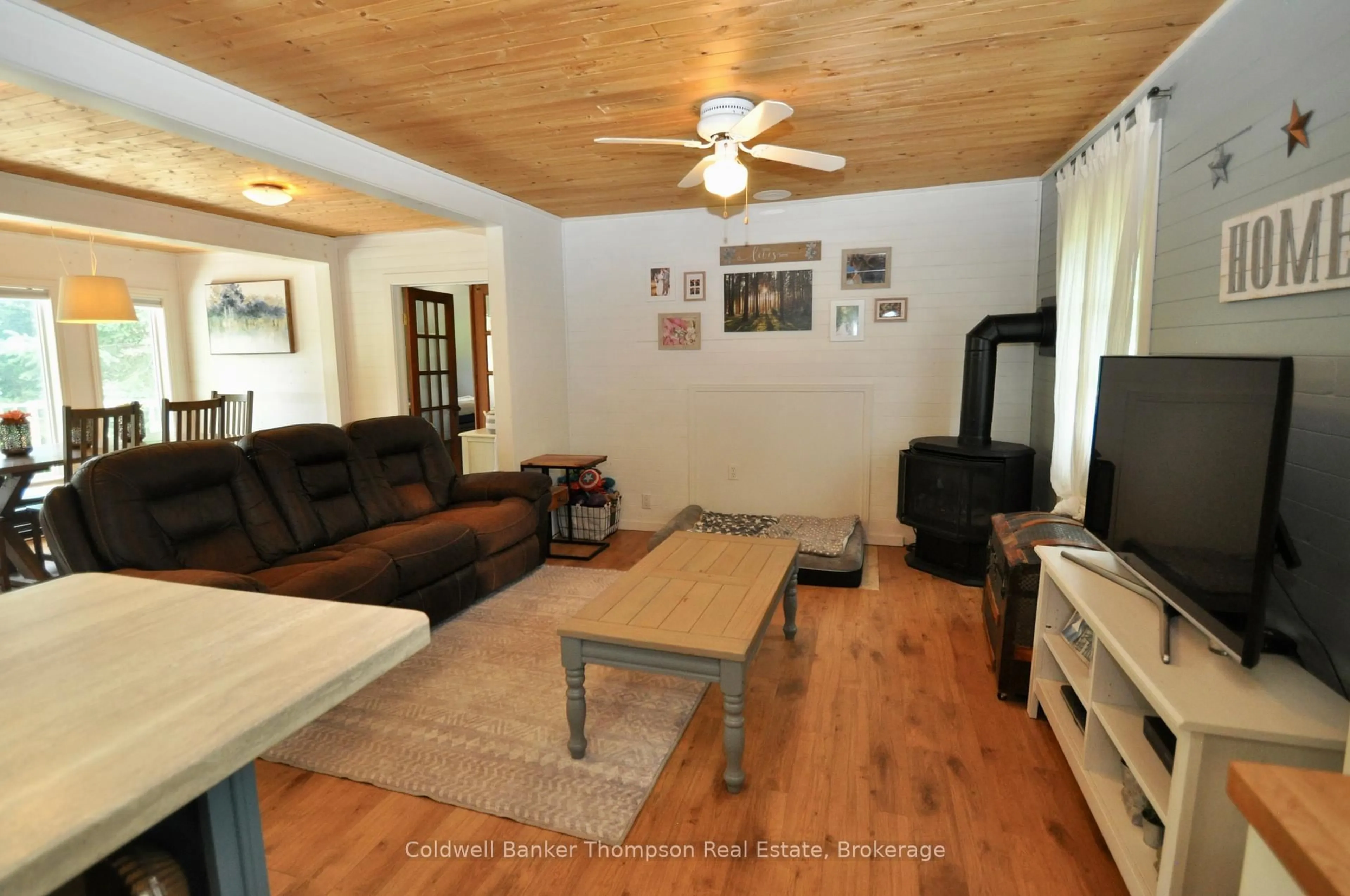 Living room with furniture, wood/laminate floor for 1116 592 Highway, Perry Ontario P0A 1J0