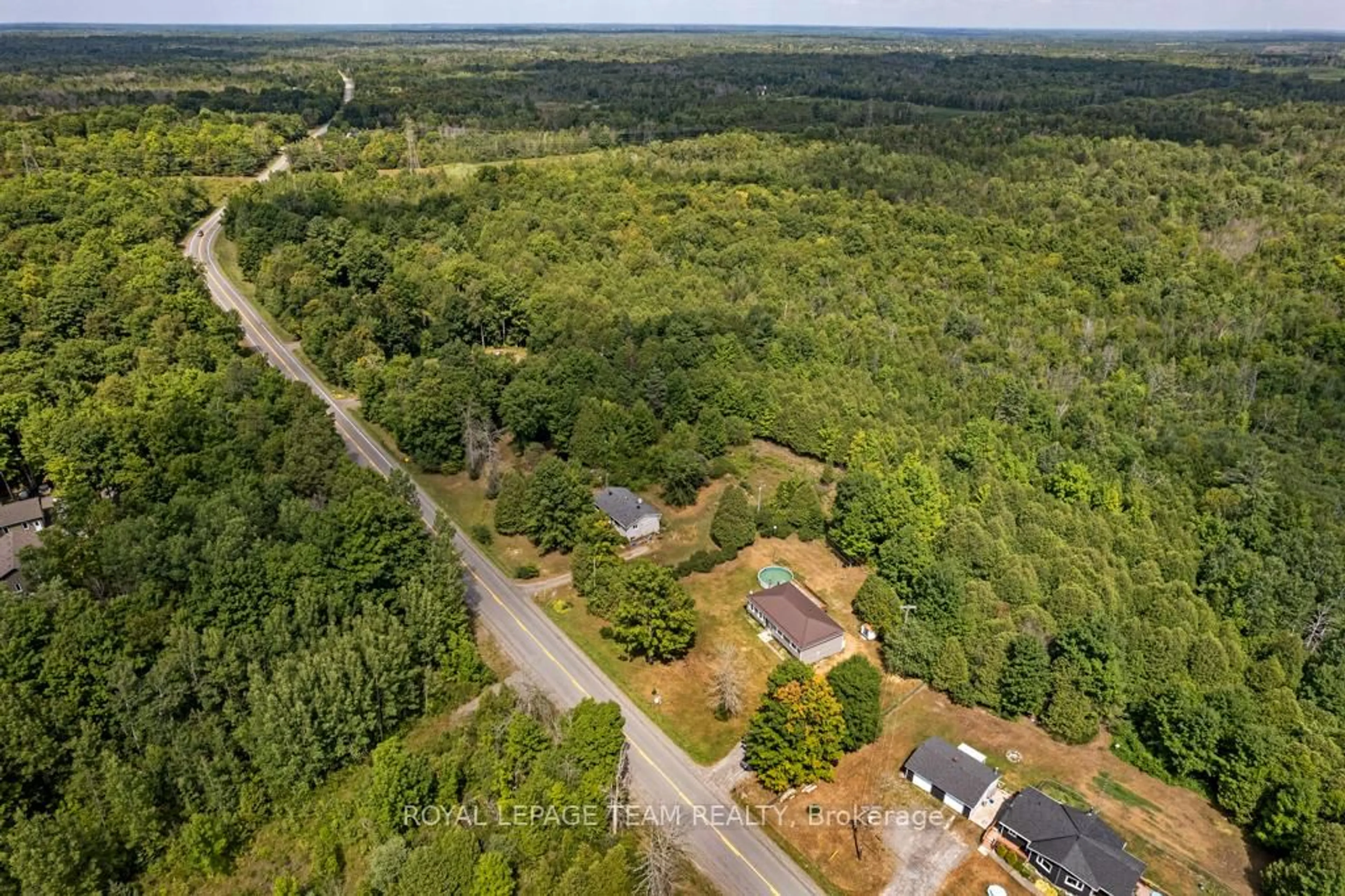 A pic from outside/outdoor area/front of a property/back of a property/a pic from drone, forest/trees view for 8133 County Rd 44 Rd, Edwardsburgh/Cardinal Ontario K0E 1X0