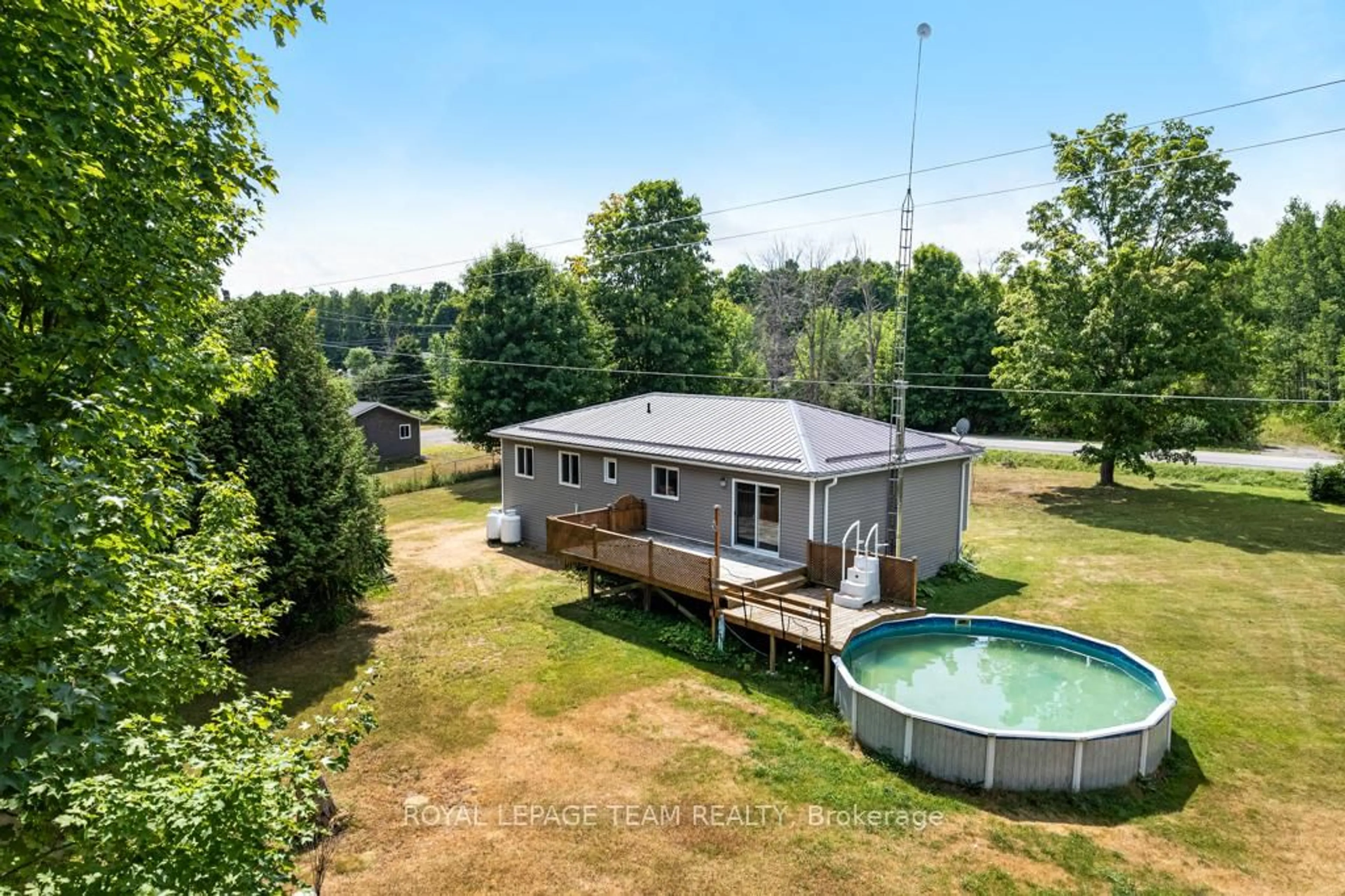 A pic from outside/outdoor area/front of a property/back of a property/a pic from drone, water/lake/river/ocean view for 8133 County Rd 44 Rd, Edwardsburgh/Cardinal Ontario K0E 1X0