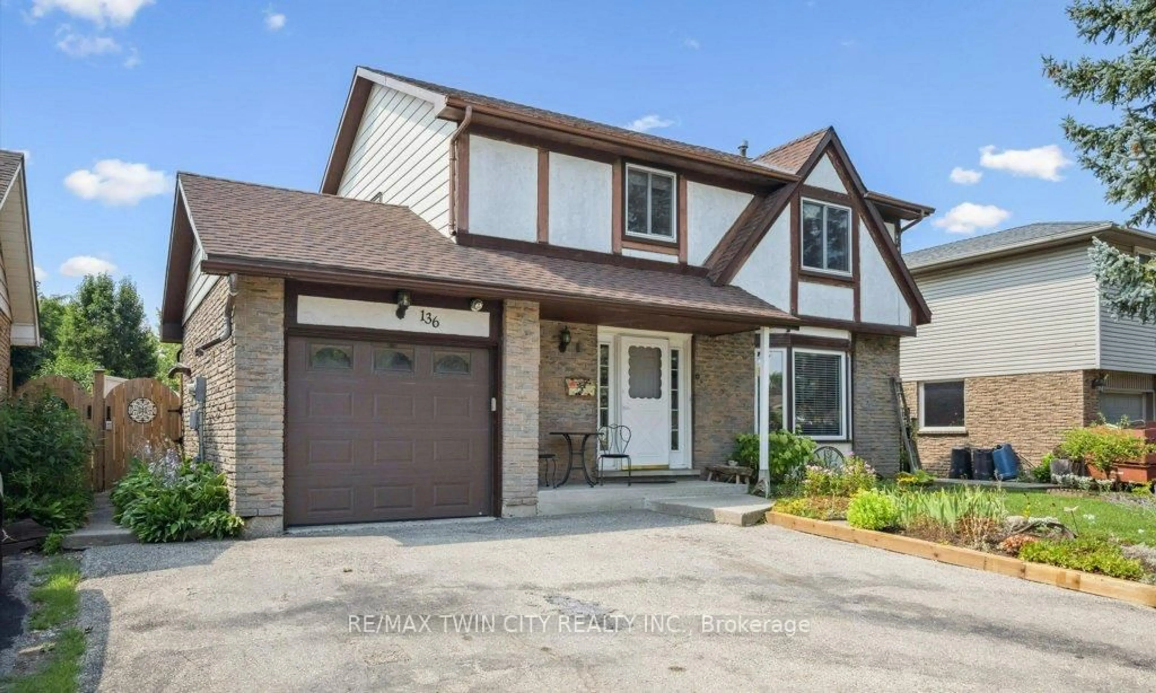 Home with brick exterior material, street for 136 St Jerome Cres, Kitchener Ontario N2C 2L2