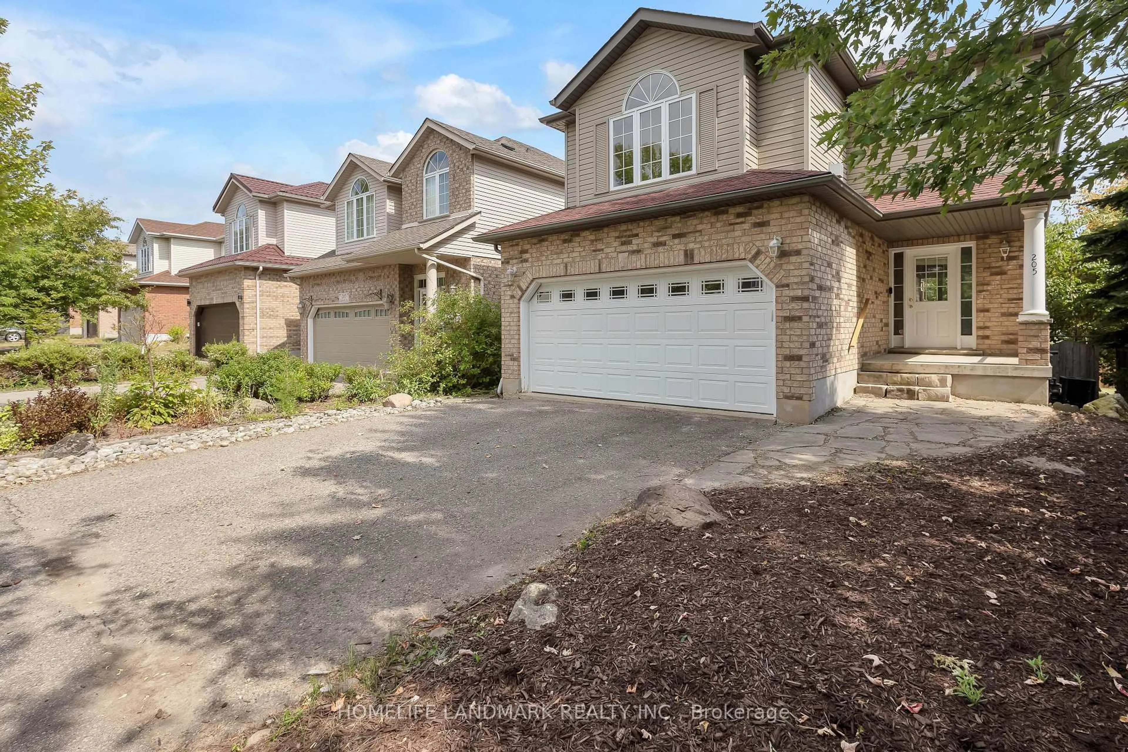 Home with brick exterior material, street for 205 Holbeach Cres, Waterloo Ontario N2J 4Y3