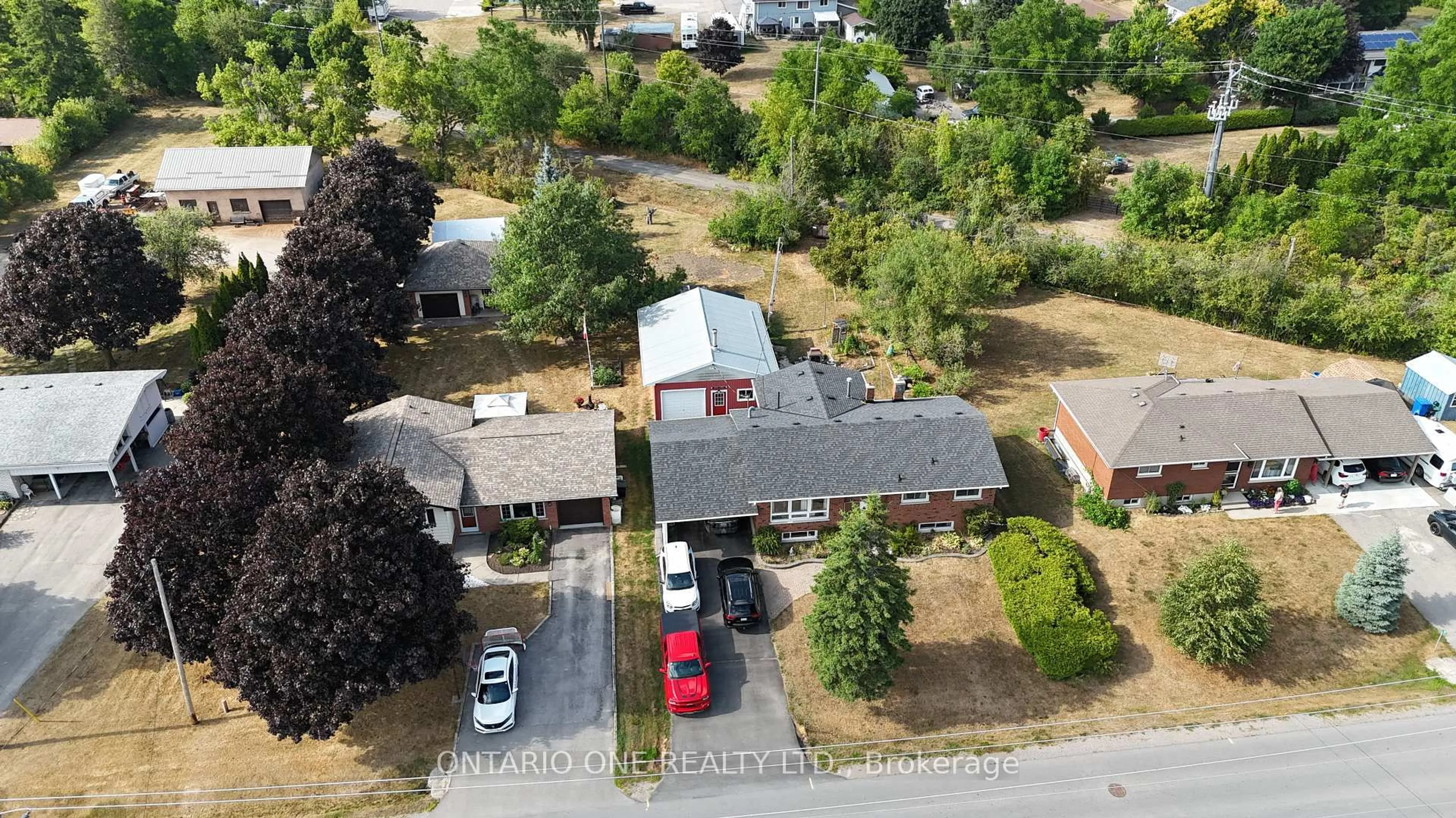 A pic from outside/outdoor area/front of a property/back of a property/a pic from drone, street for 15 Weldon Rd, Kawartha Lakes Ontario K9V 4R4