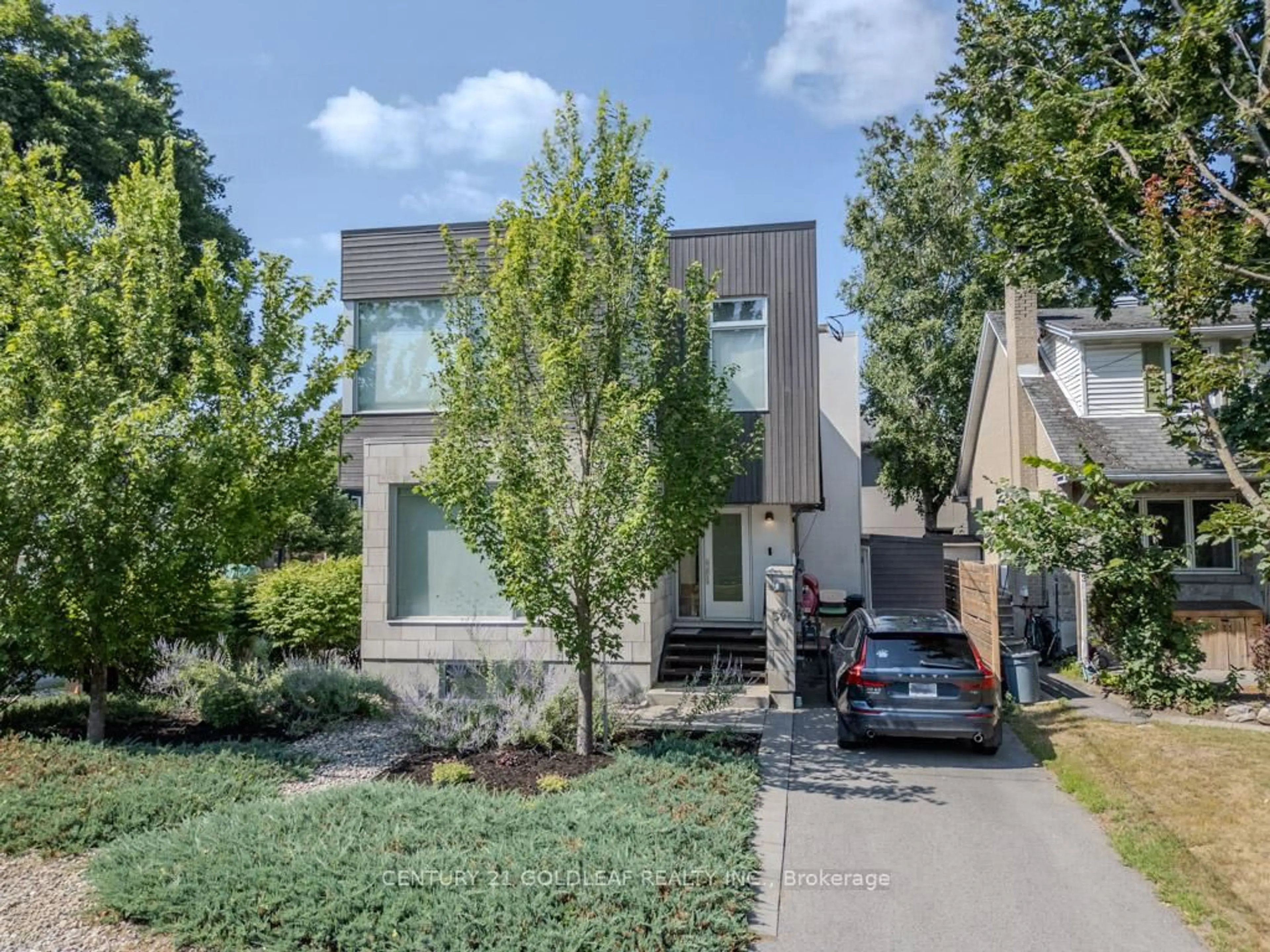 Home with brick exterior material, street for 594 Tweedsmuir Ave, Ottawa Ontario K1Z 5P2