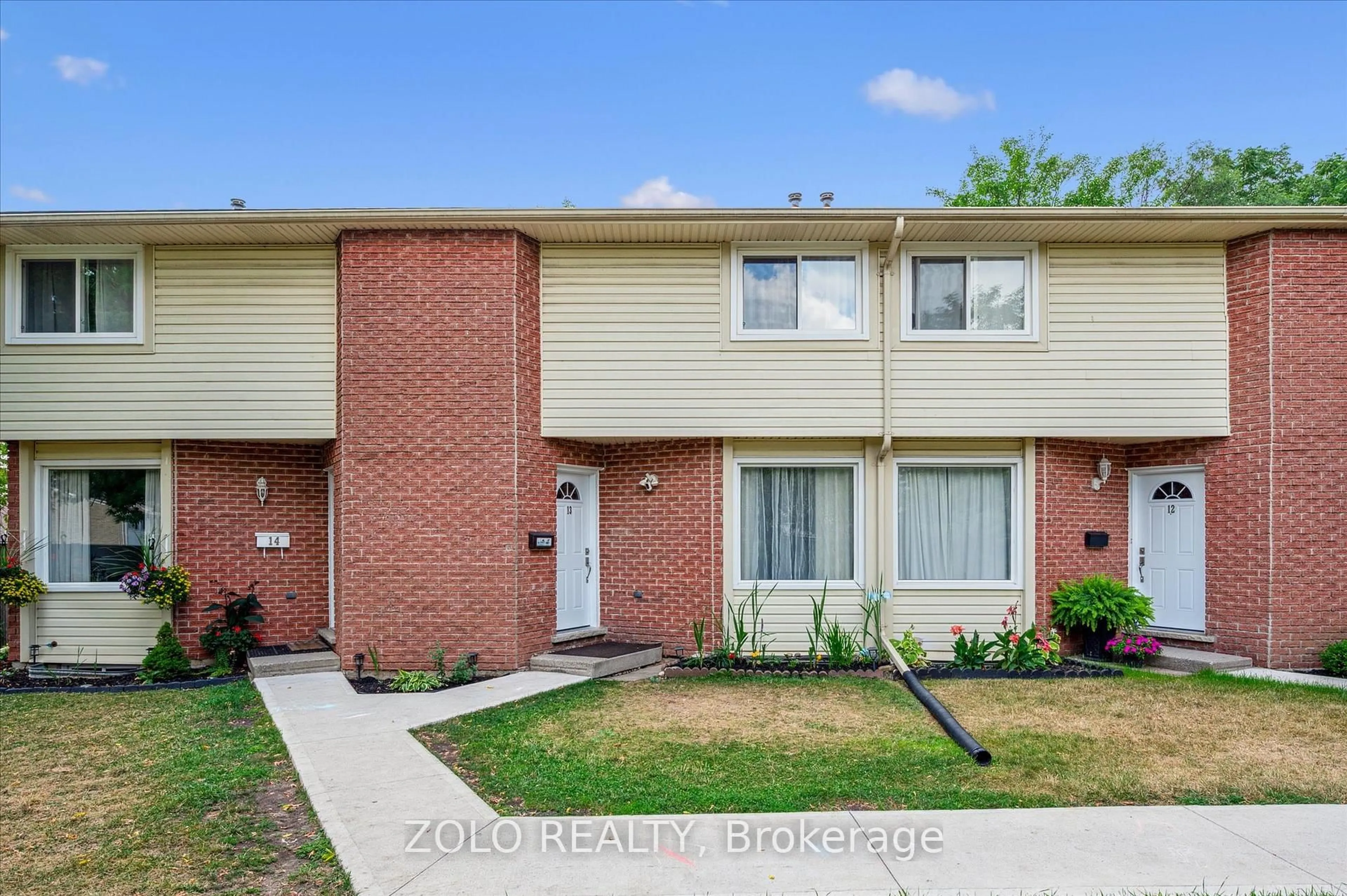Home with brick exterior material, street for 203 Fairway Rd N Rd #13, Out of Area Ontario N2A 2N7