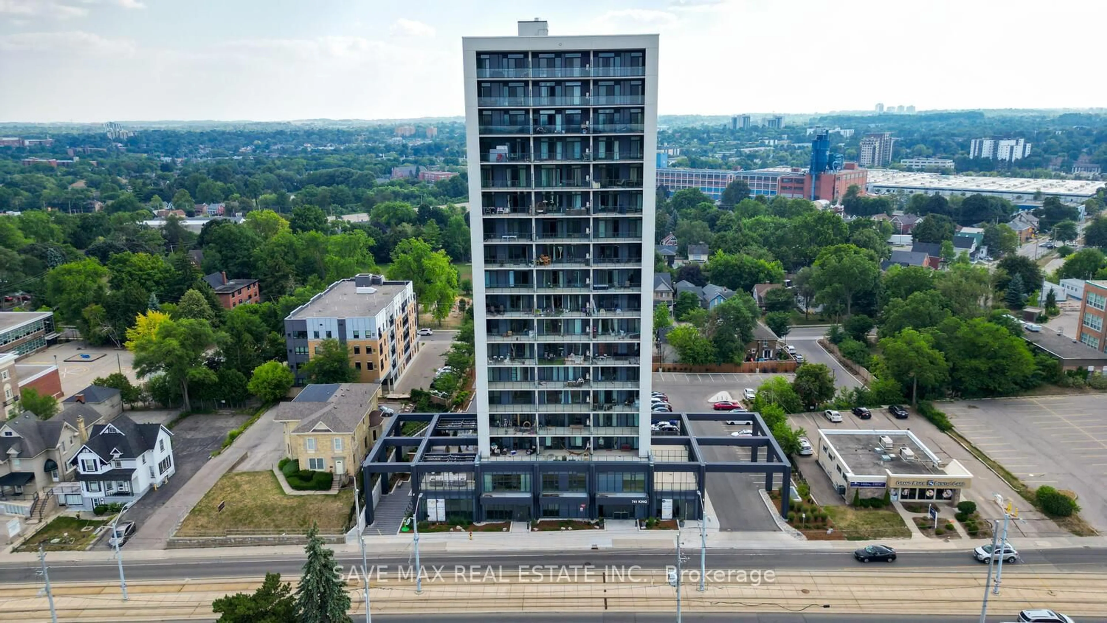 A pic from outside/outdoor area/front of a property/back of a property/a pic from drone, building for 741 King St #411, Kitchener Ontario N2G 0E9