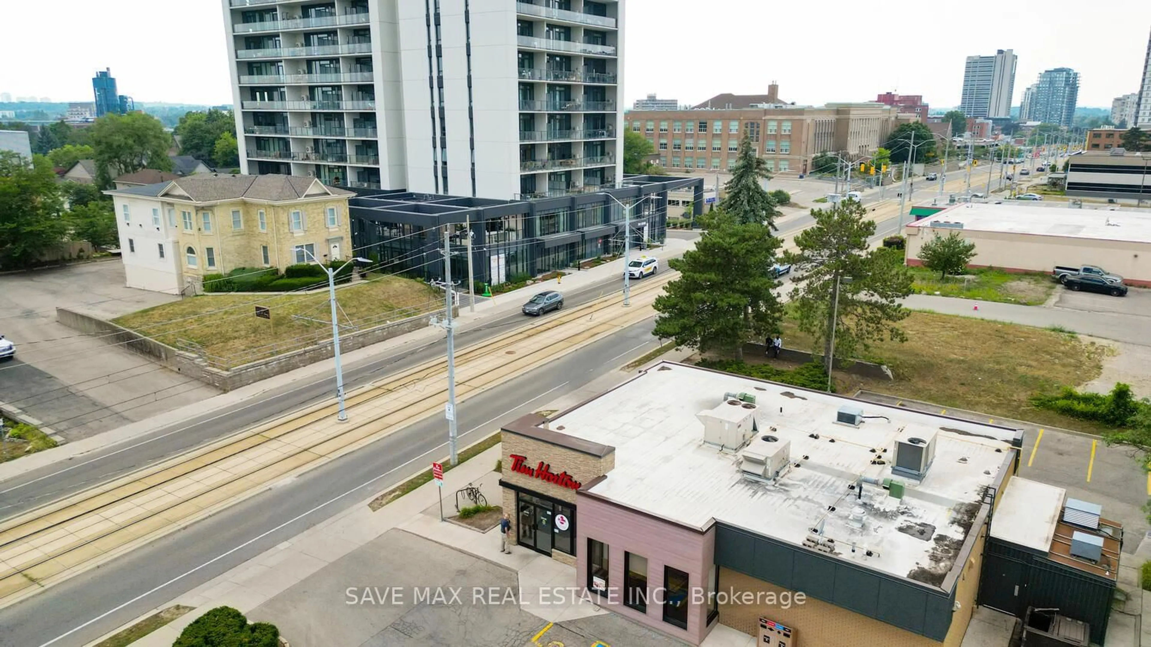 A pic from outside/outdoor area/front of a property/back of a property/a pic from drone, city buildings view from balcony for 741 King St #411, Kitchener Ontario N2G 0E9
