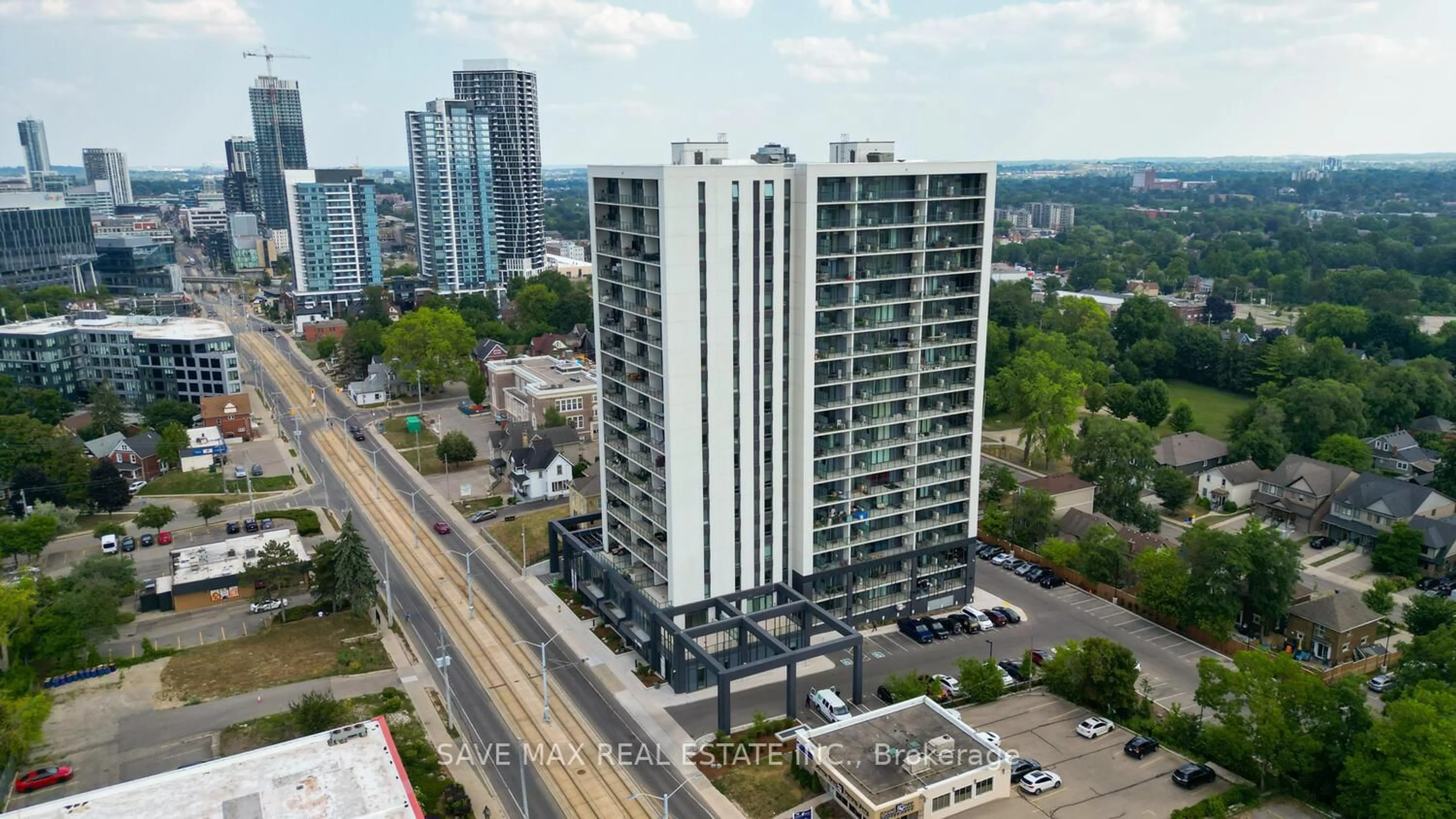 A pic from outside/outdoor area/front of a property/back of a property/a pic from drone, city buildings view from balcony for 741 King St #411, Kitchener Ontario N2G 0E9