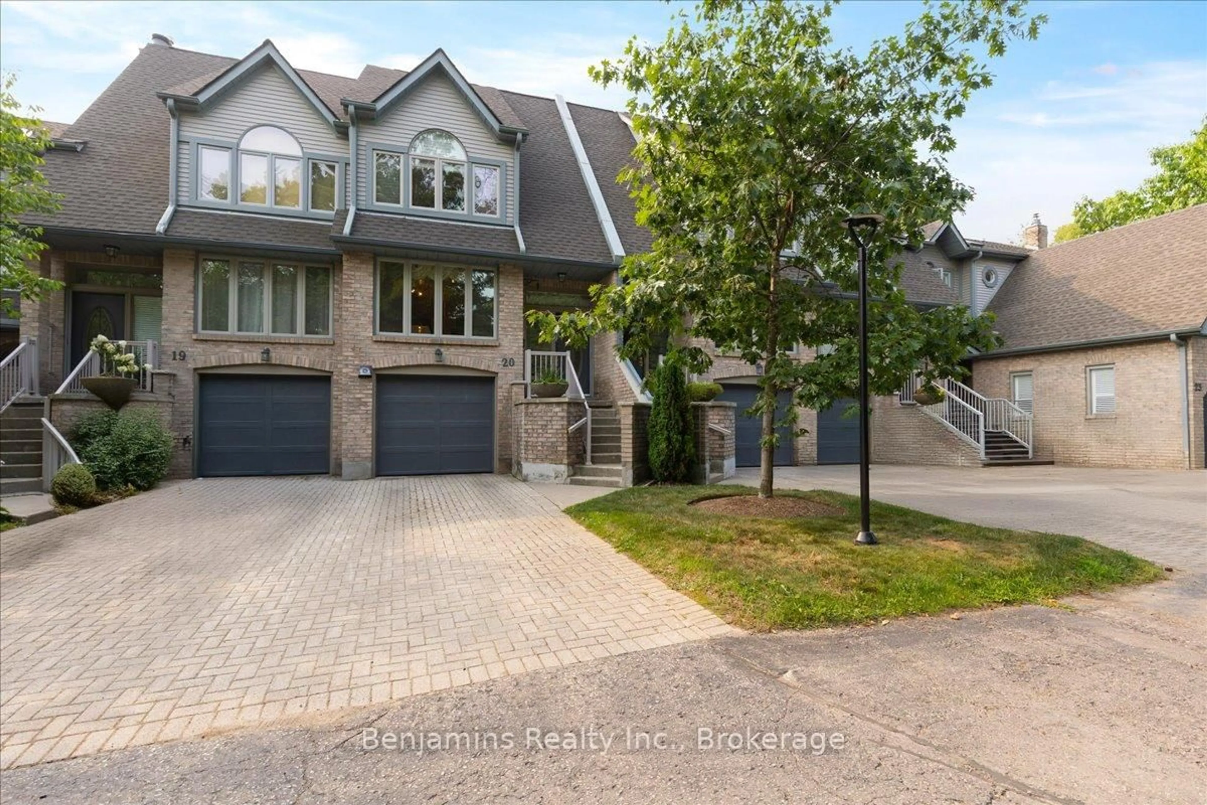 Home with brick exterior material, street for 225 Benjamin Rd #20, Waterloo Ontario N2V 1Z3