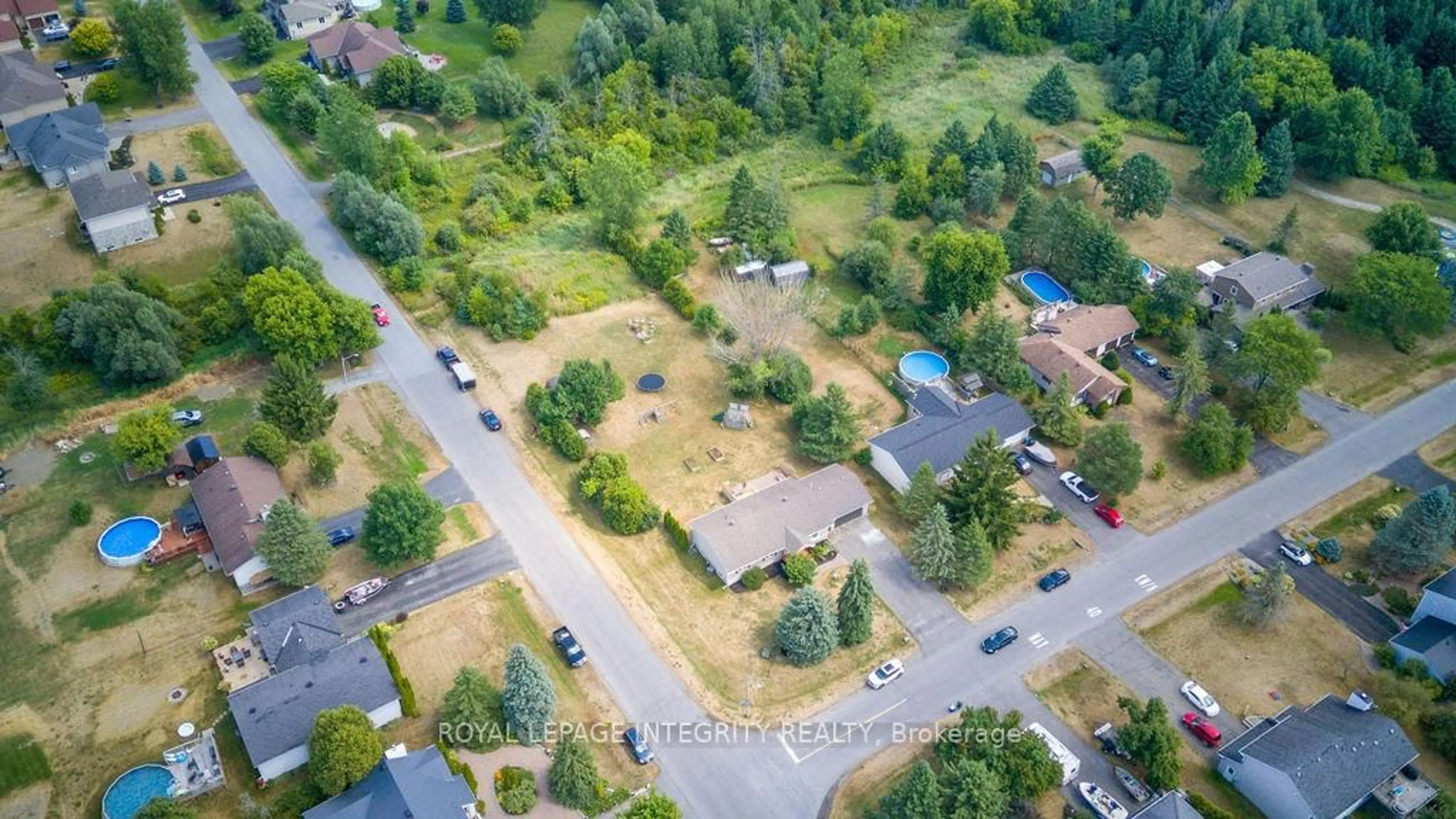 A pic from outside/outdoor area/front of a property/back of a property/a pic from drone, street for 1500 Blue Rock Ave, Kars Ontario K0A 2E0