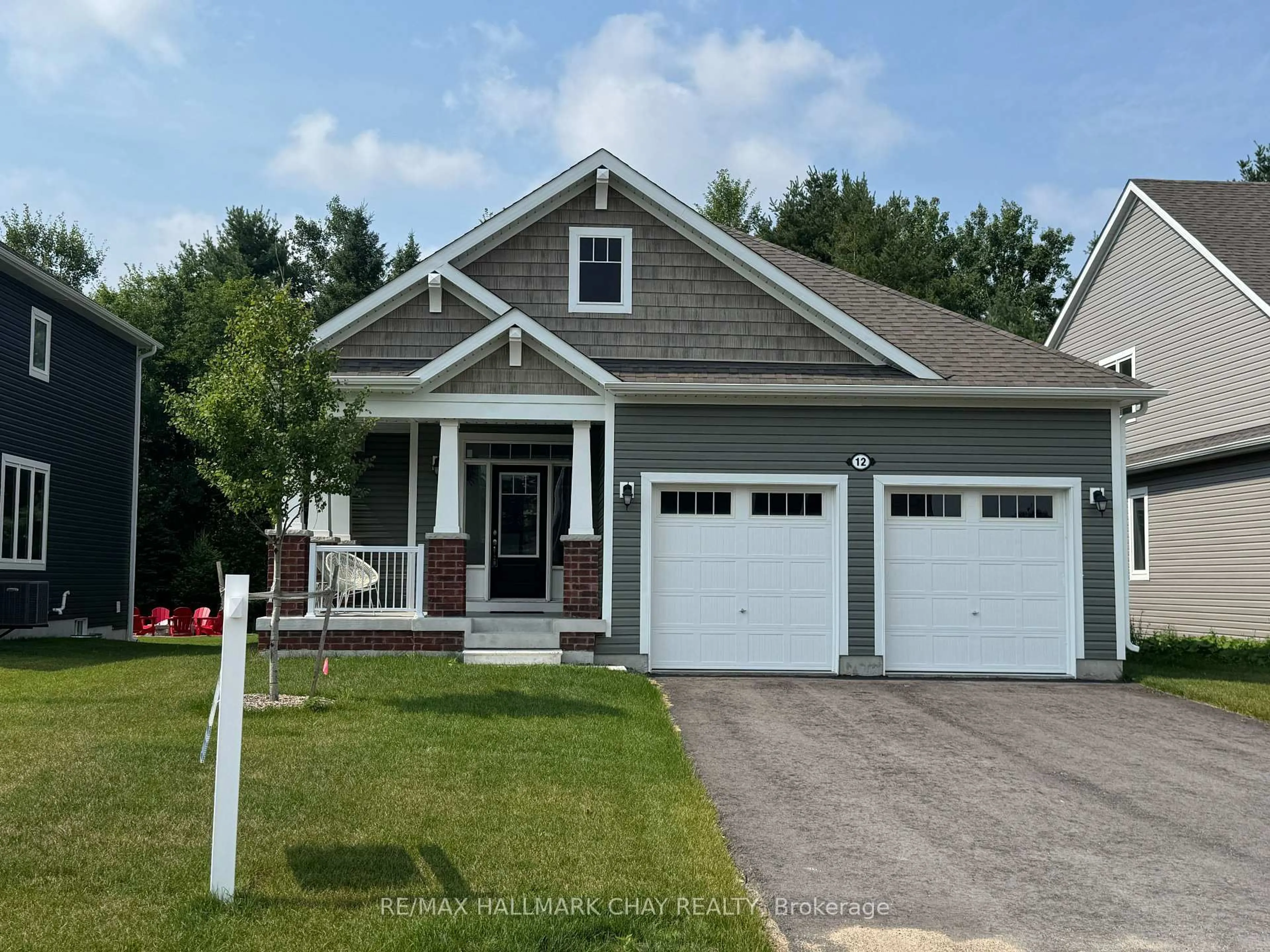 Home with vinyl exterior material, street for 12 Dyer Cres, Bracebridge Ontario P1L 0N4