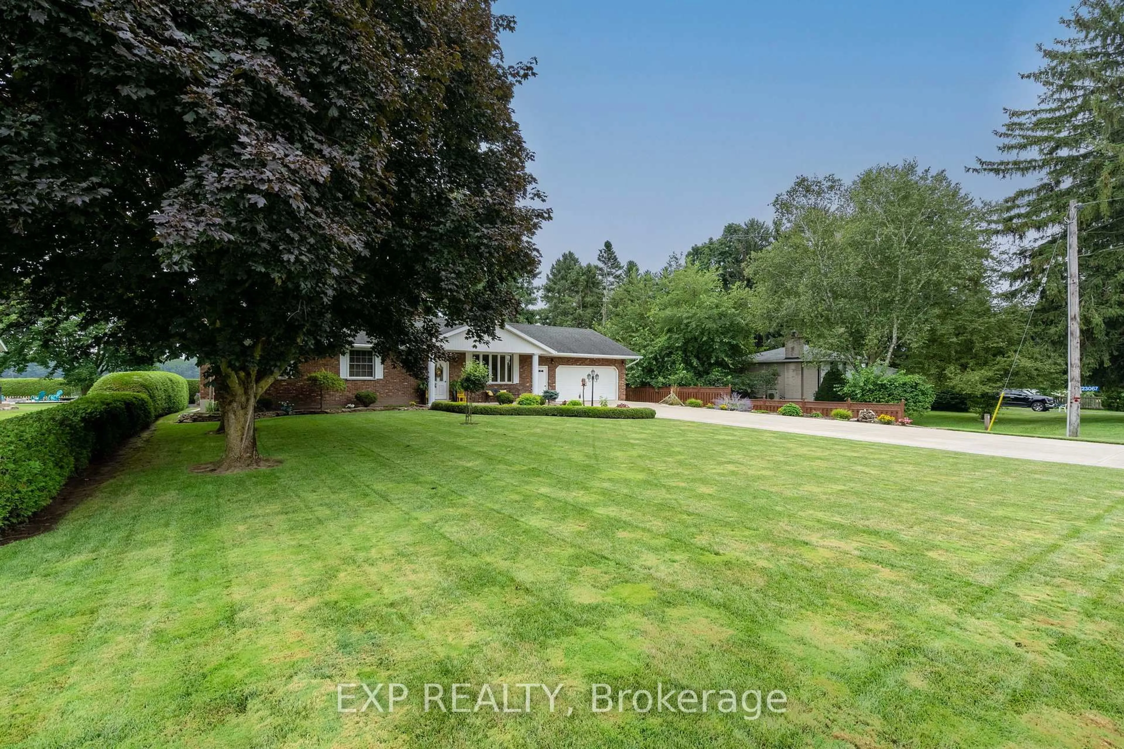 A pic from outside/outdoor area/front of a property/back of a property/a pic from drone, water/lake/river/ocean view for 23067 Pioneer Line, West Elgin Ontario N0L 2C0