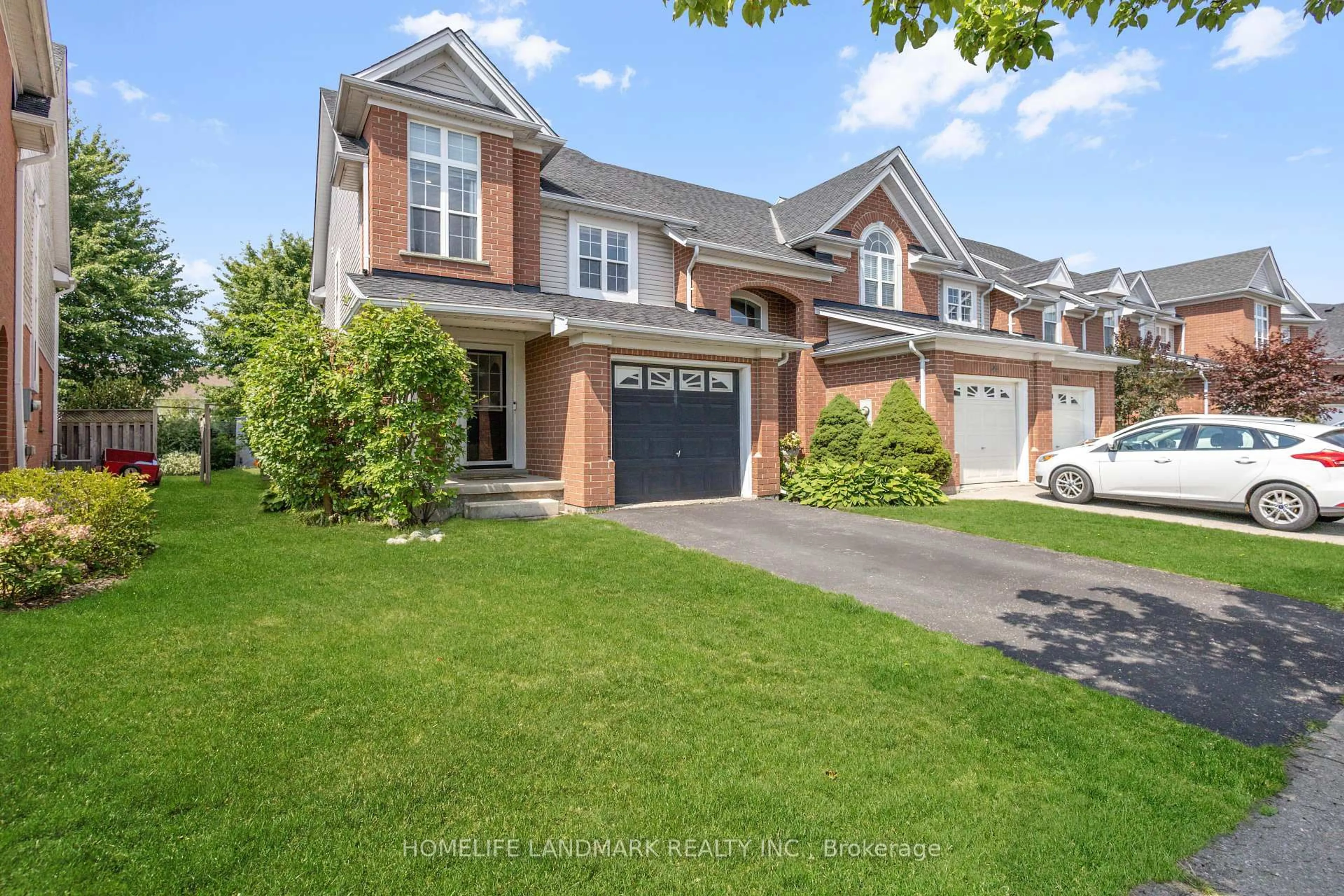 Home with brick exterior material, street for 568 Beaver Creek Cres, Waterloo Ontario N2V 2J6