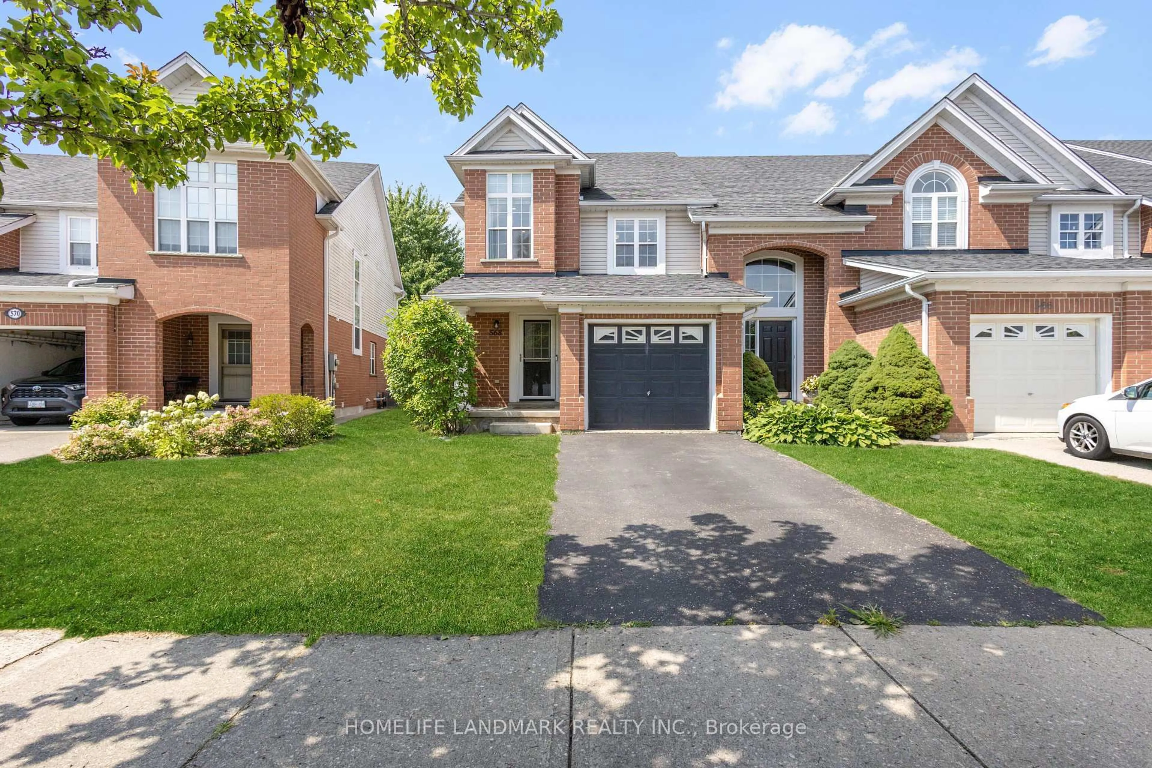 Home with brick exterior material, street for 568 Beaver Creek Cres, Waterloo Ontario N2V 2J6