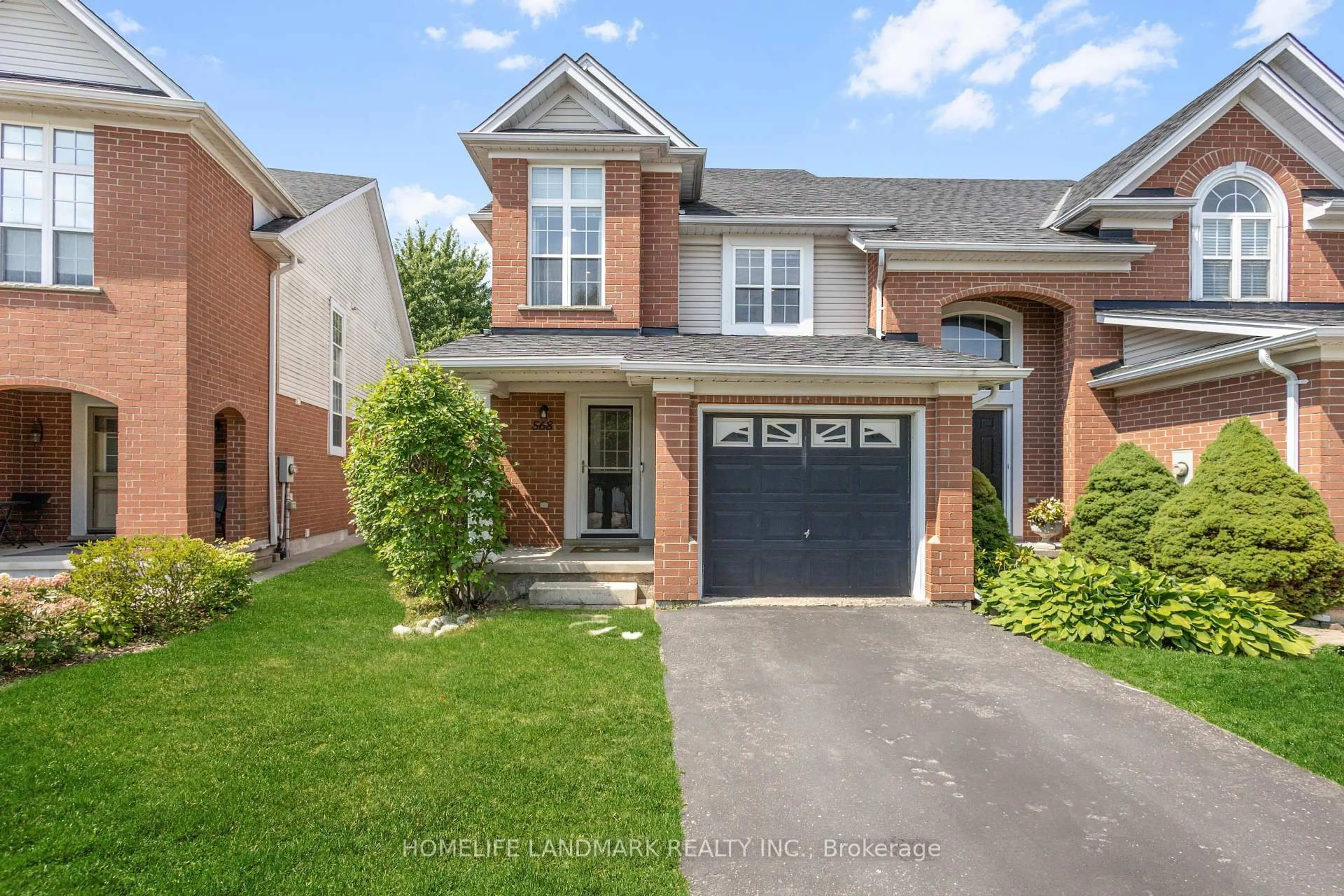 Home with brick exterior material, street for 568 Beaver Creek Cres, Waterloo Ontario N2V 2J6
