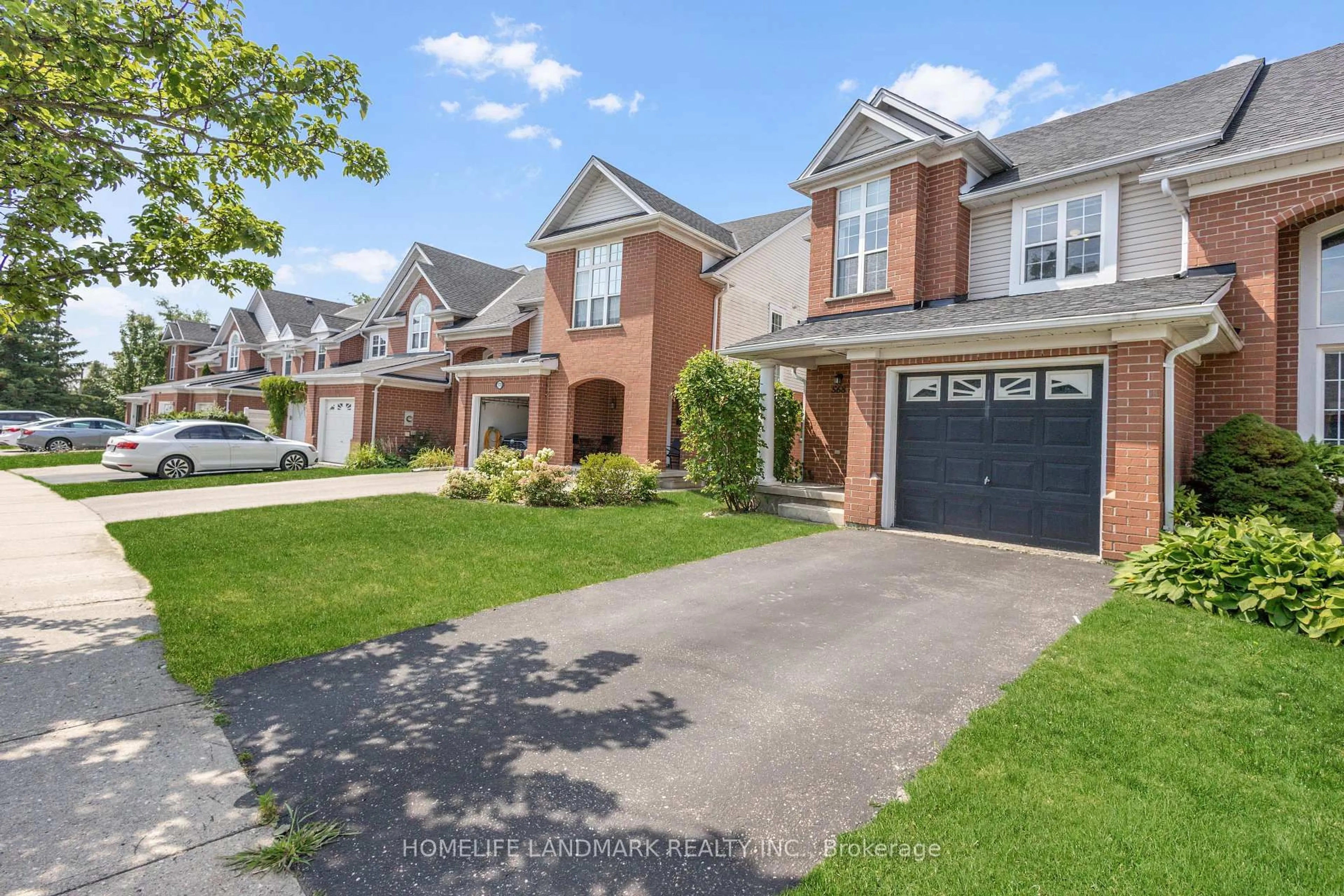 Home with brick exterior material, street for 568 Beaver Creek Cres, Waterloo Ontario N2V 2J6