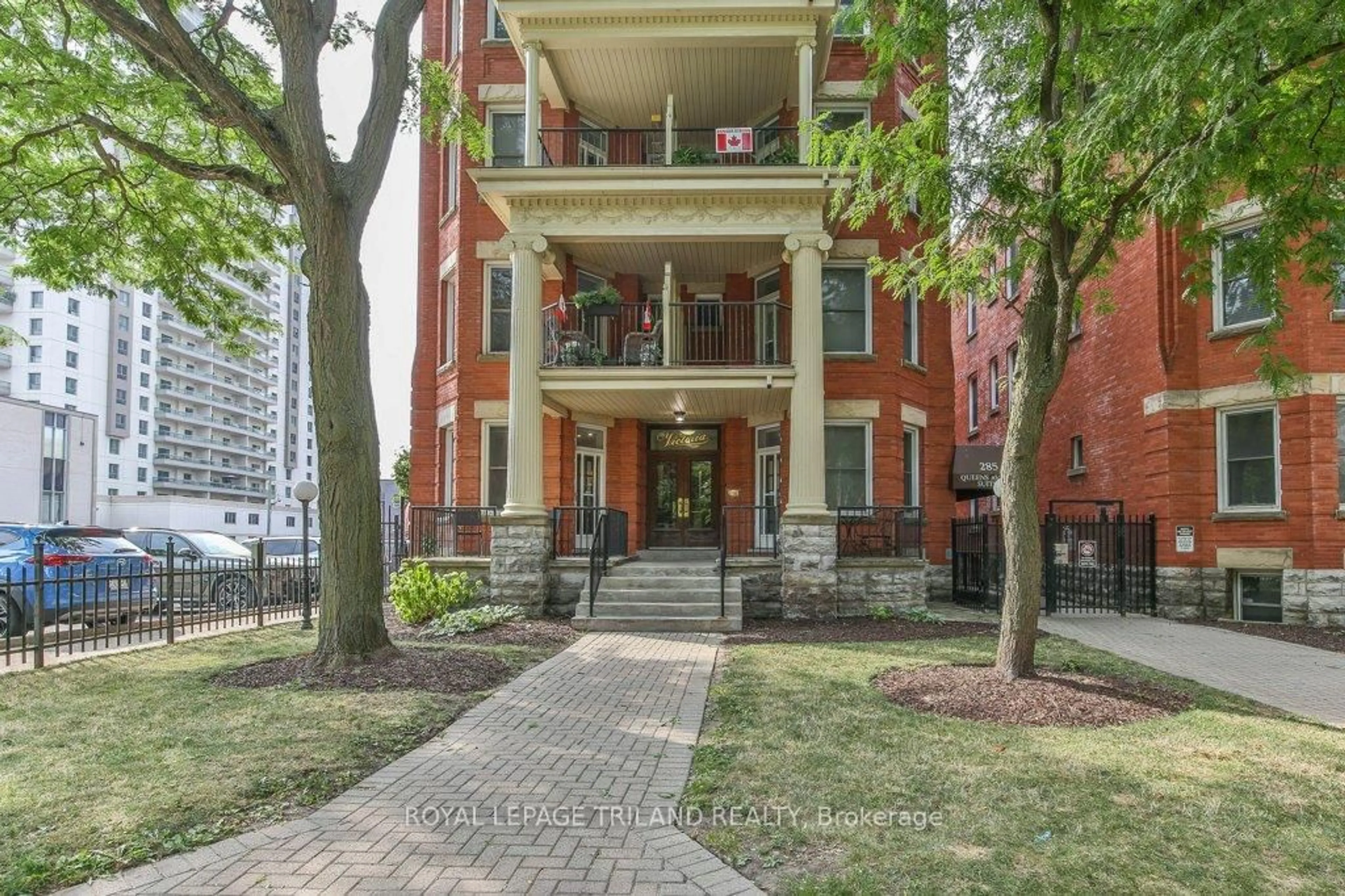 Home with brick exterior material, street for 285 QUEENS Ave #101, London East Ontario N6B 1X2
