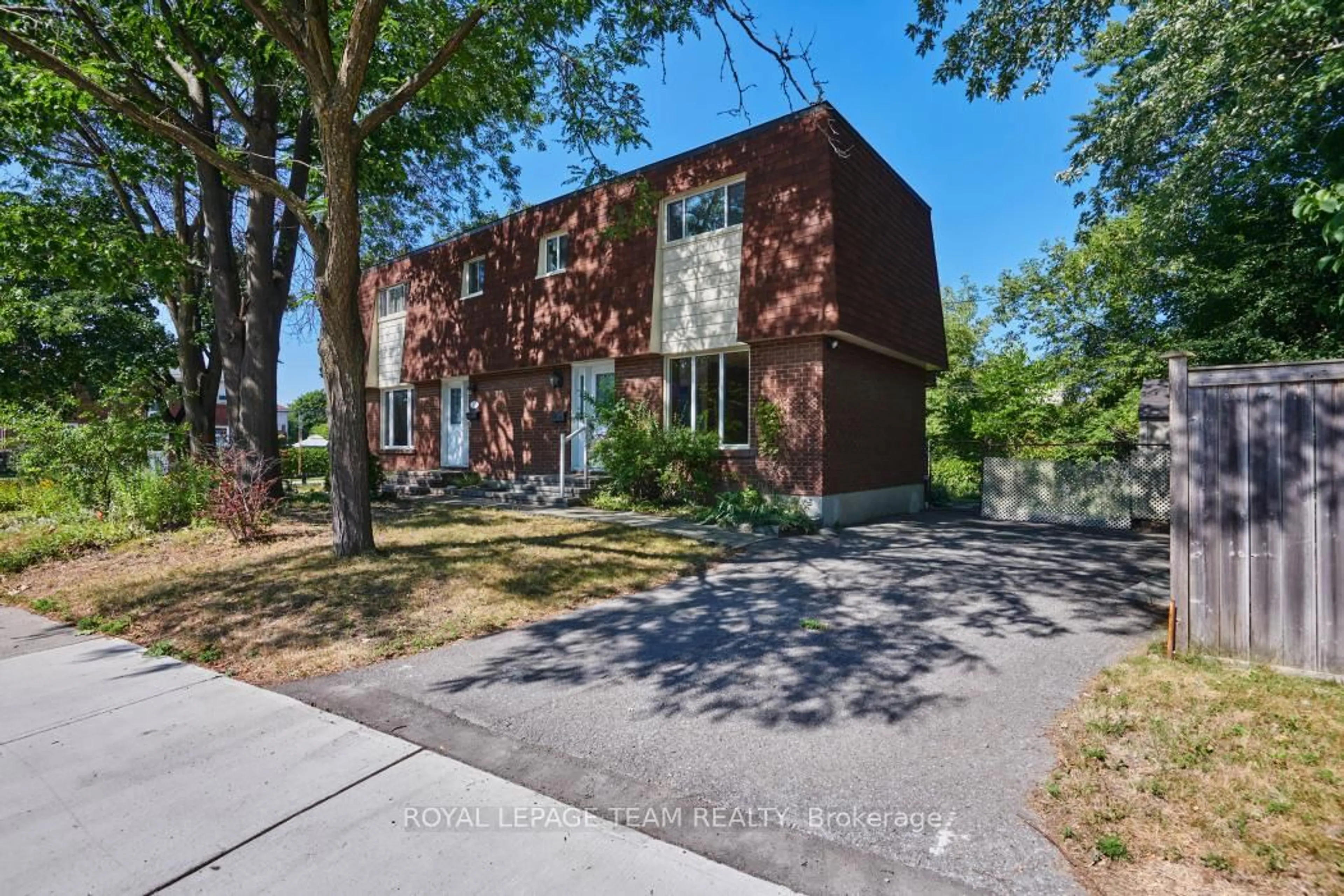 Home with brick exterior material, street for 939 Kirkwood Ave, Ottawa Ontario K1Z 8N1