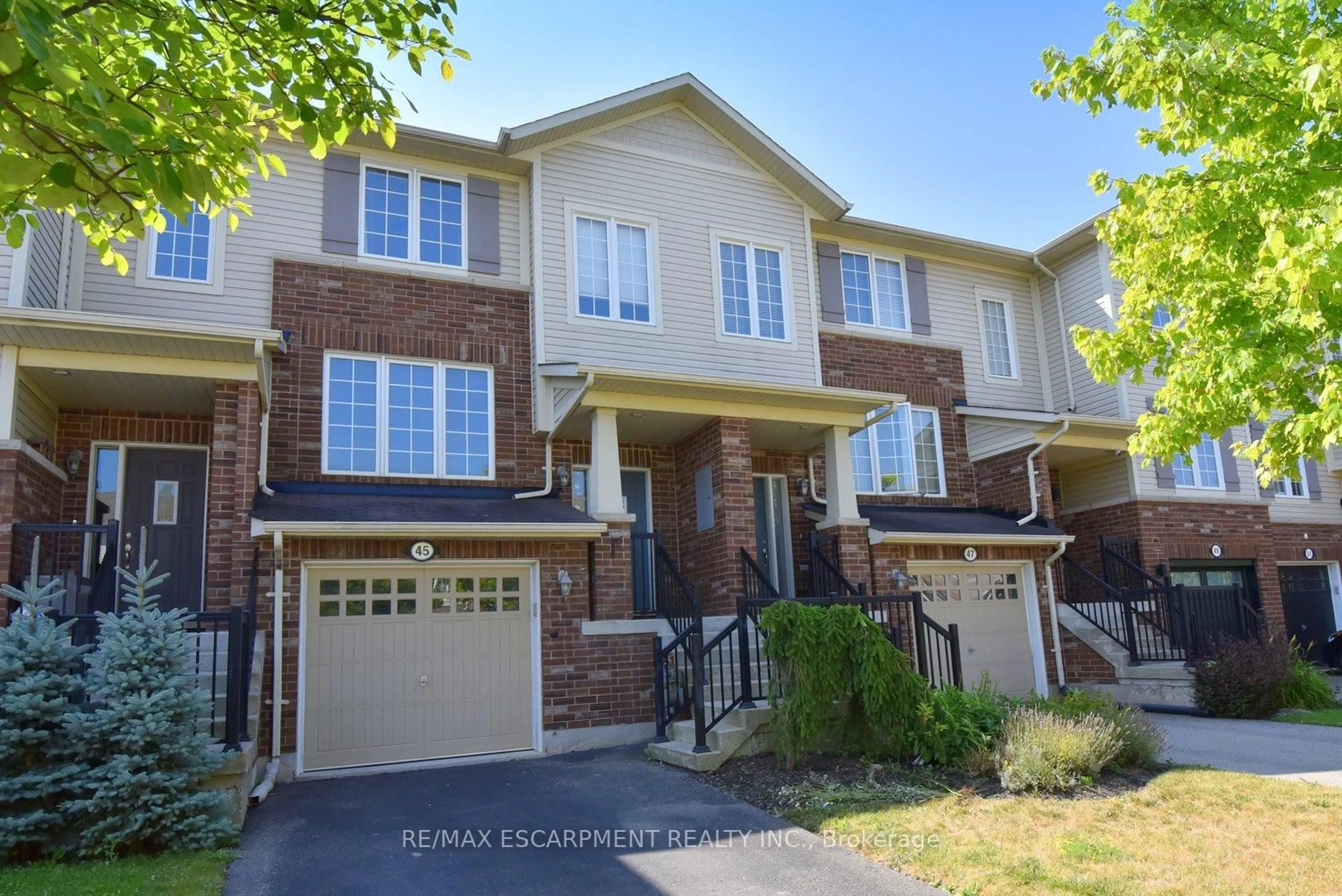 Home with brick exterior material, street for 45 Ohara Lane, Hamilton Ontario L9K 0C7