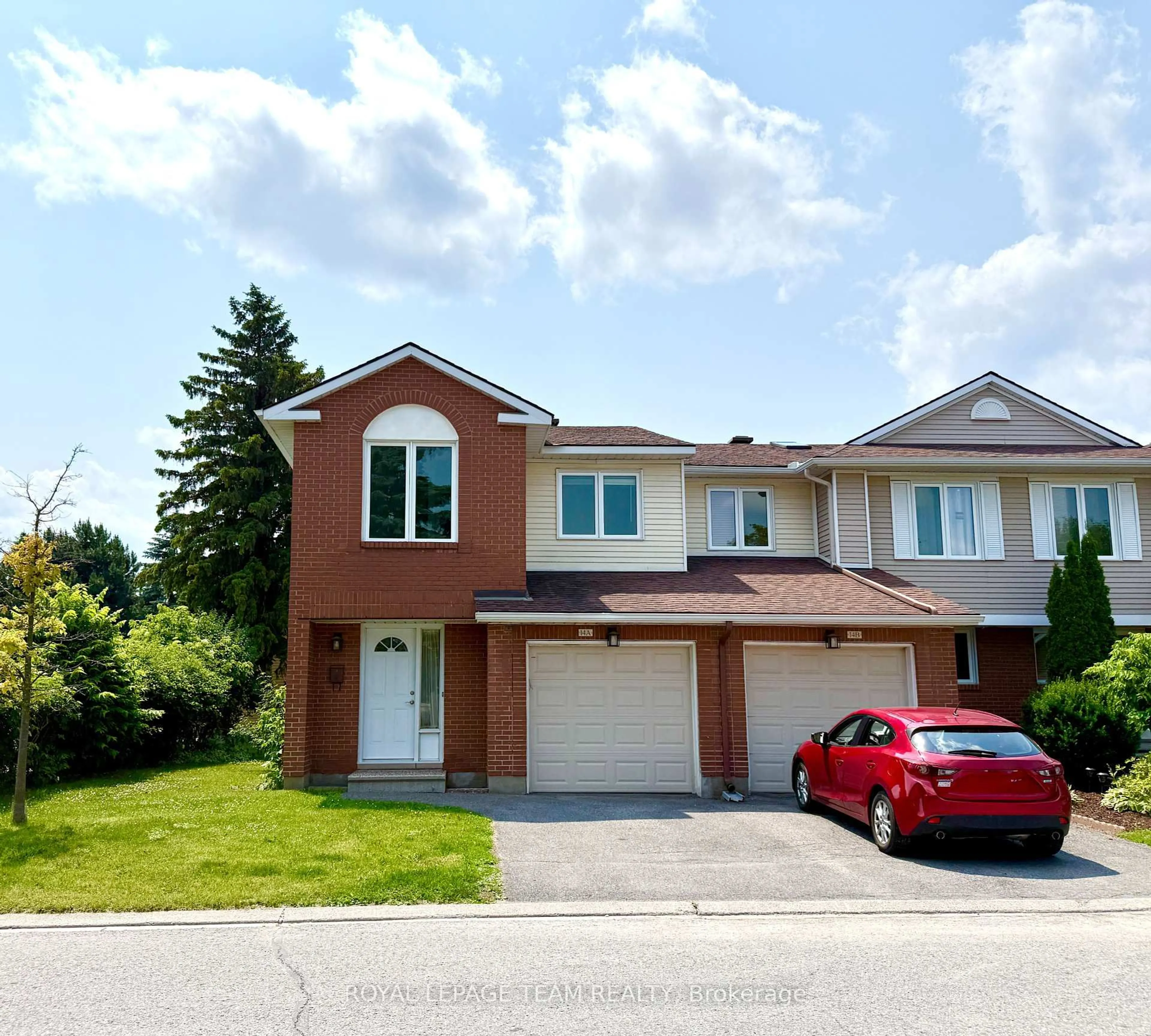 Home with brick exterior material, street for 14 Castlebrook Lane #A, Ottawa Ontario K2G 5G4