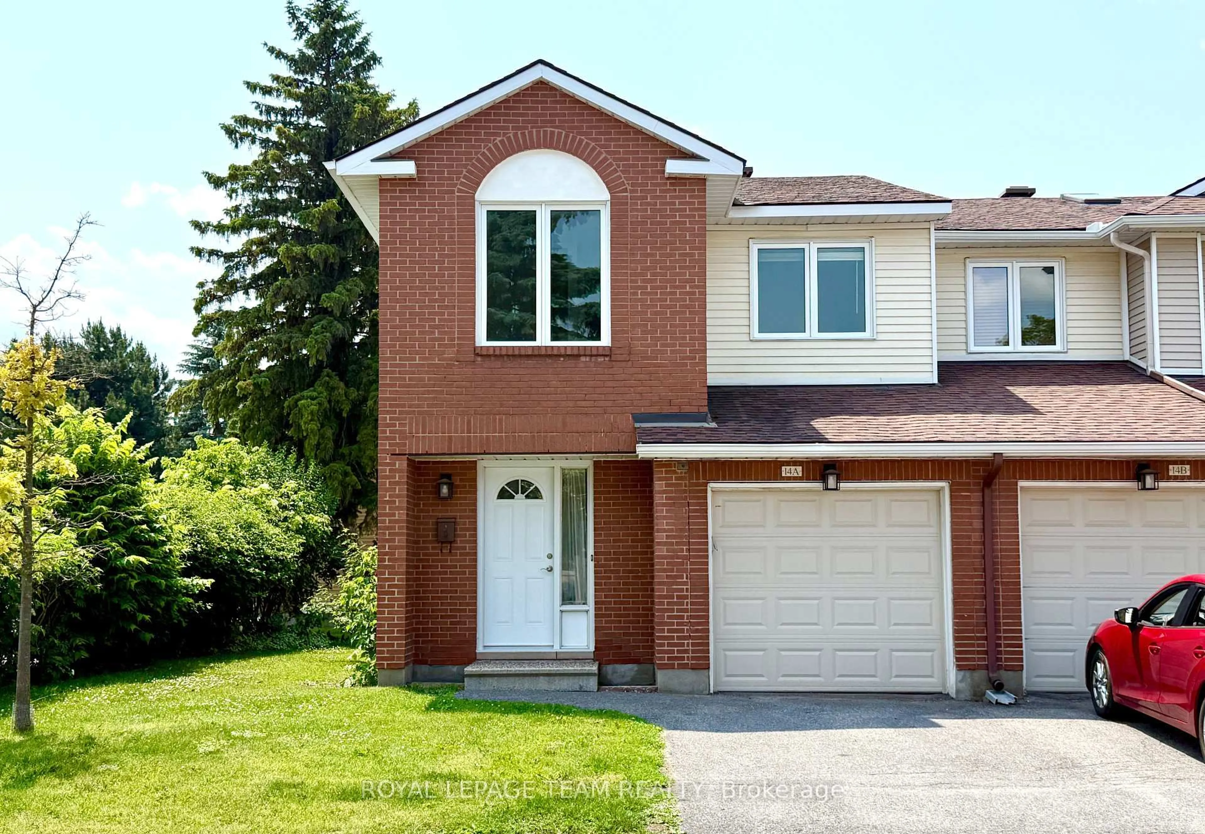 Home with brick exterior material, street for 14 Castlebrook Lane #A, Ottawa Ontario K2G 5G4