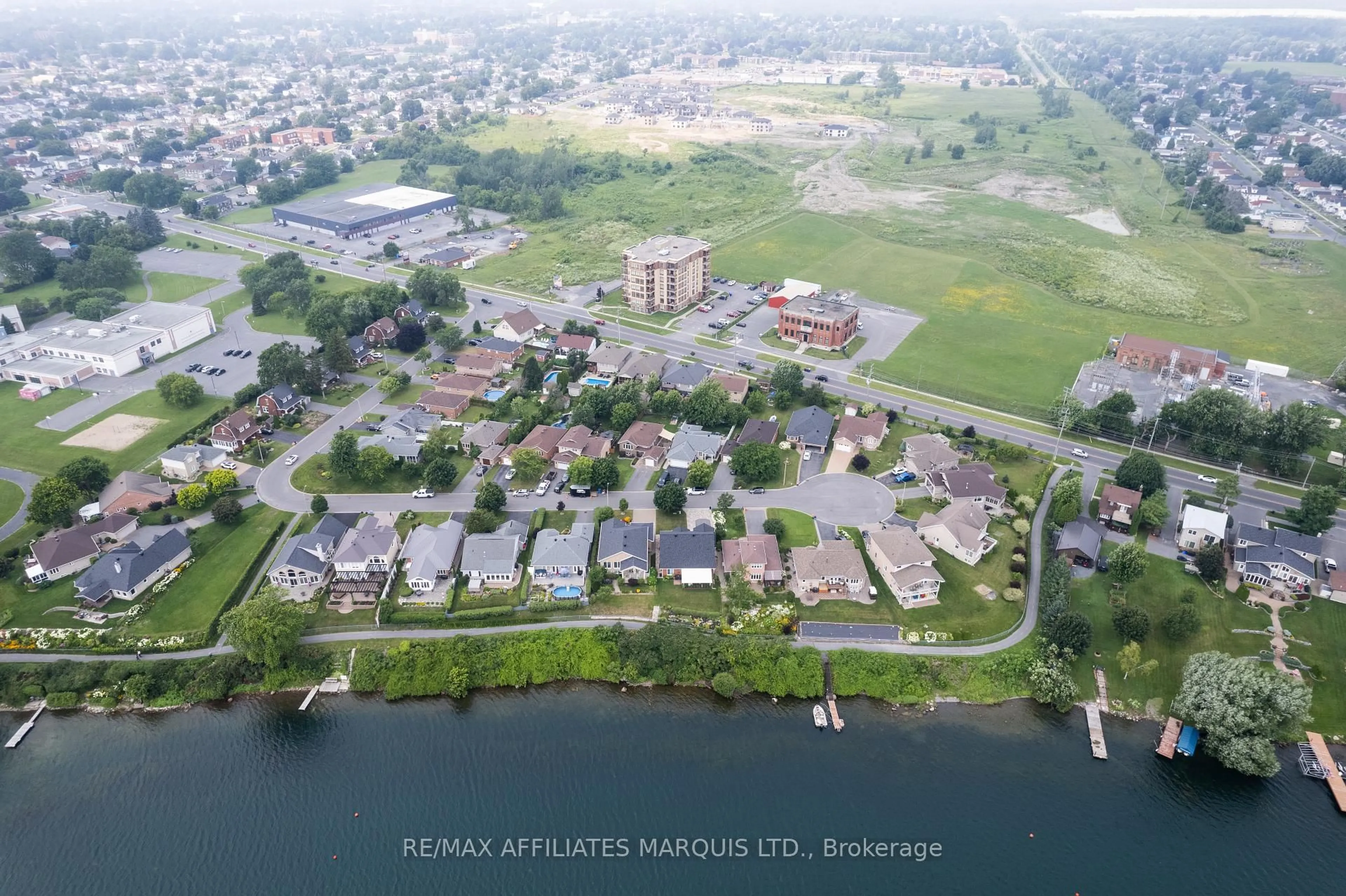 A pic from outside/outdoor area/front of a property/back of a property/a pic from drone, water/lake/river/ocean view for 1161 Kirkman Crt, Cornwall Ontario K6H 5E2