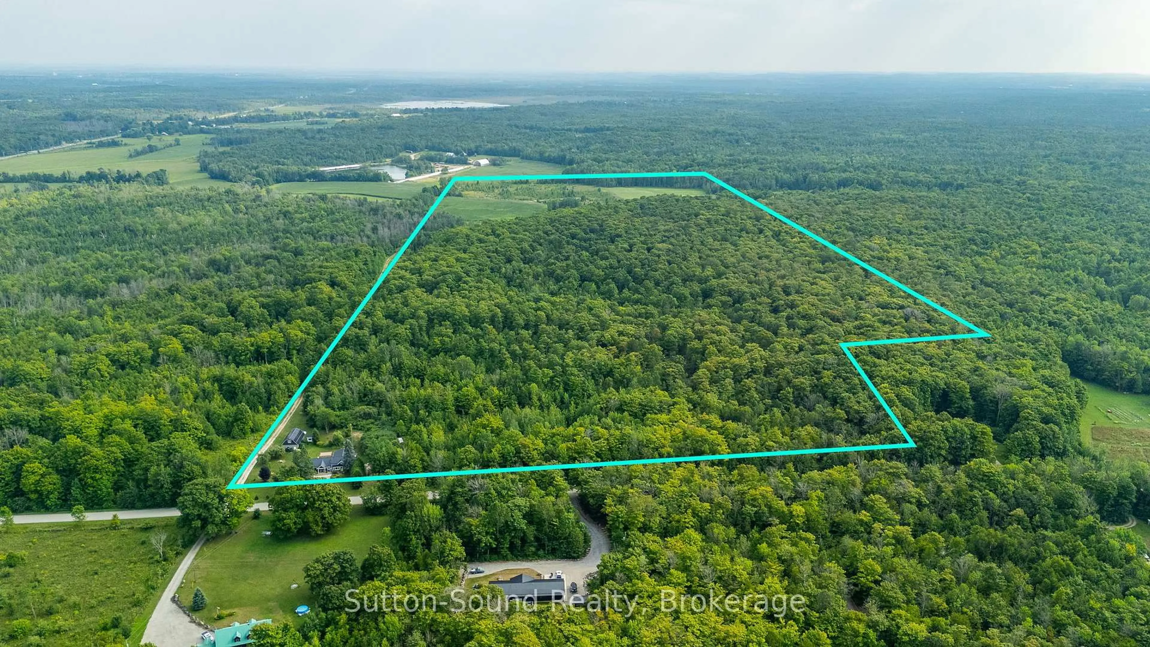 A pic from outside/outdoor area/front of a property/back of a property/a pic from drone, forest/trees view for 87 Meadowland Rd, South Bruce Peninsula Ontario N0H 2T0