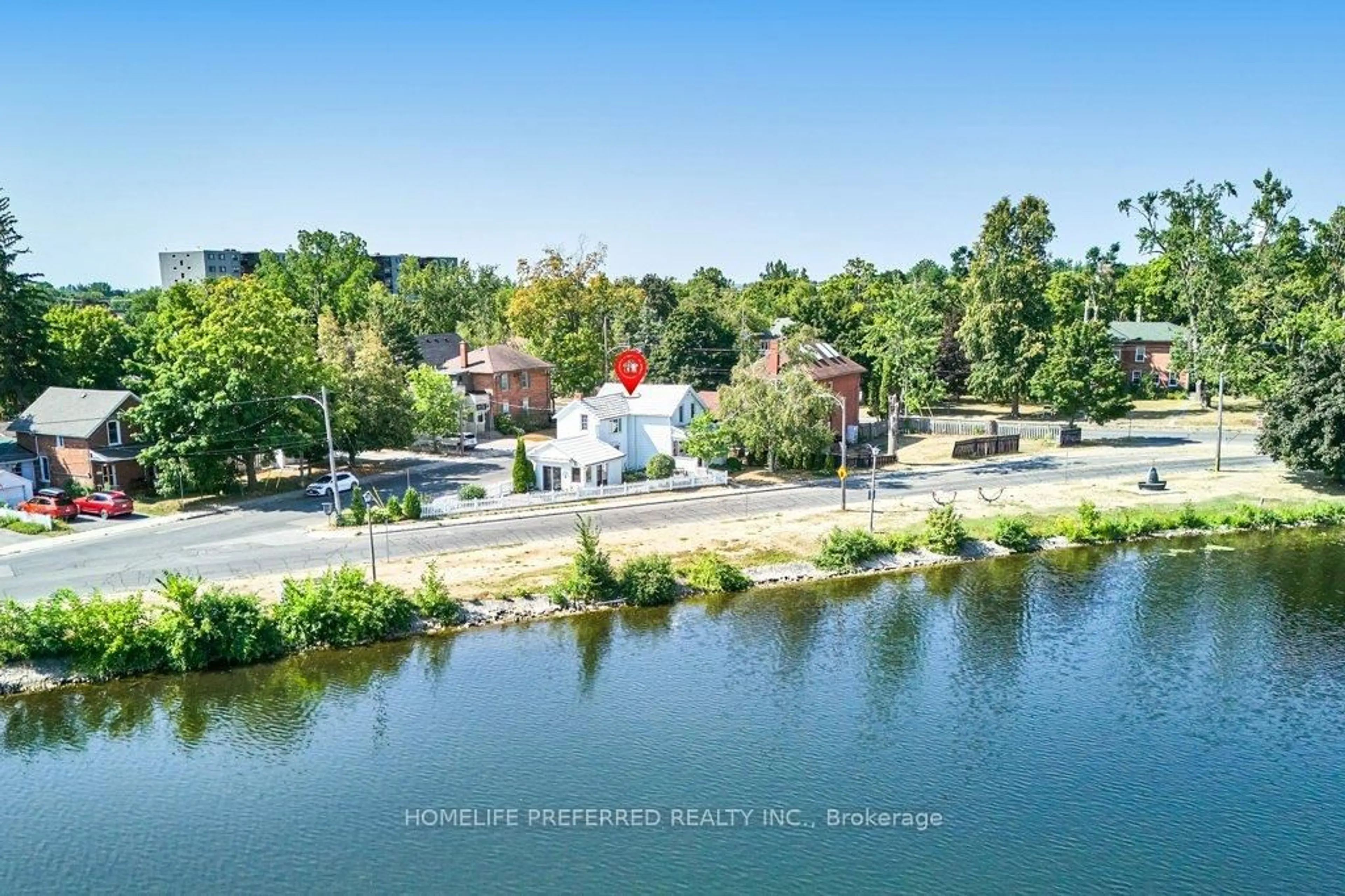 A pic from outside/outdoor area/front of a property/back of a property/a pic from drone, water/lake/river/ocean view for 157 Crescent St, Peterborough Central Ontario K9J 2G4