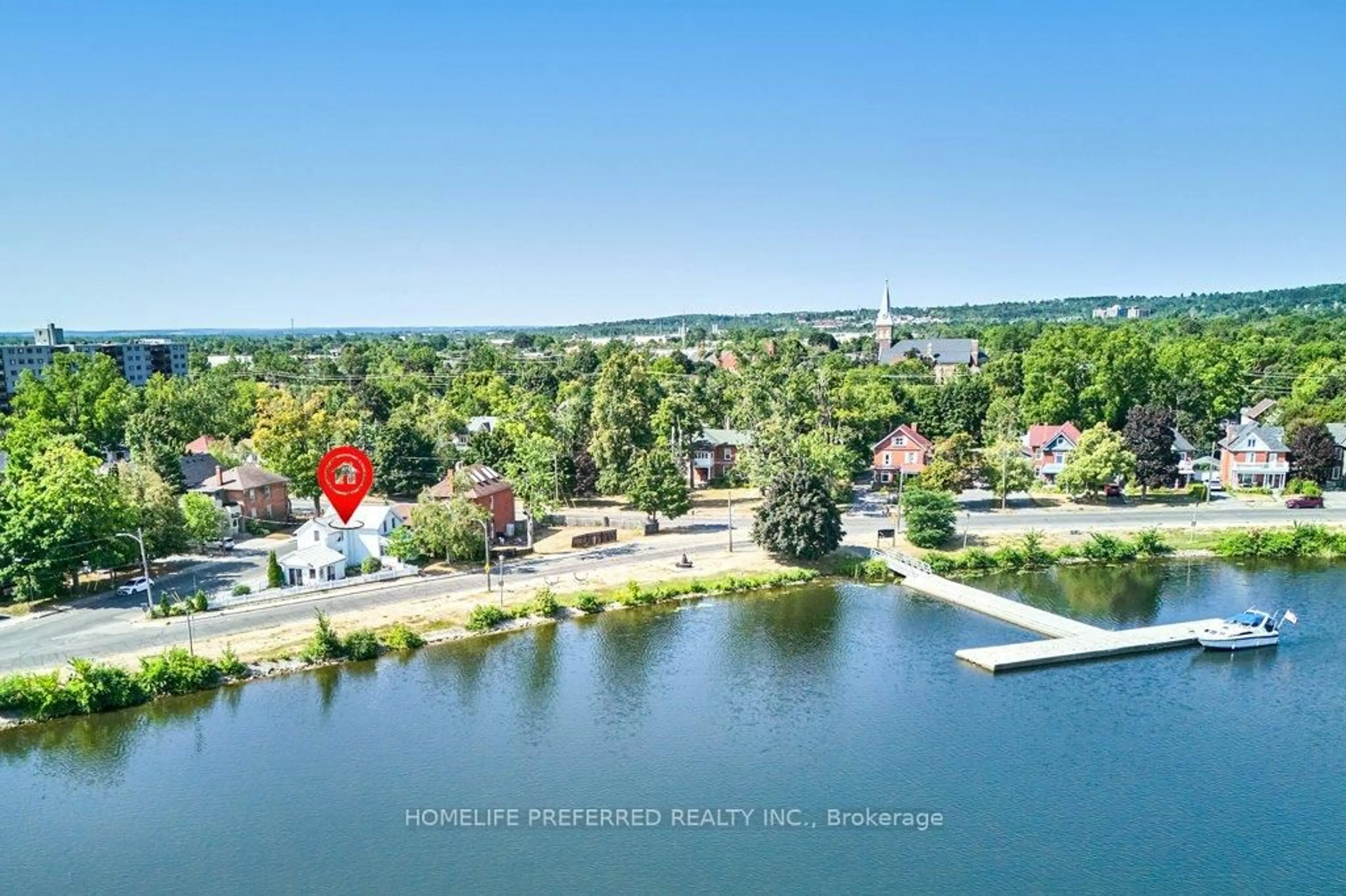 A pic from outside/outdoor area/front of a property/back of a property/a pic from drone, water/lake/river/ocean view for 157 Crescent St, Peterborough Central Ontario K9J 2G4