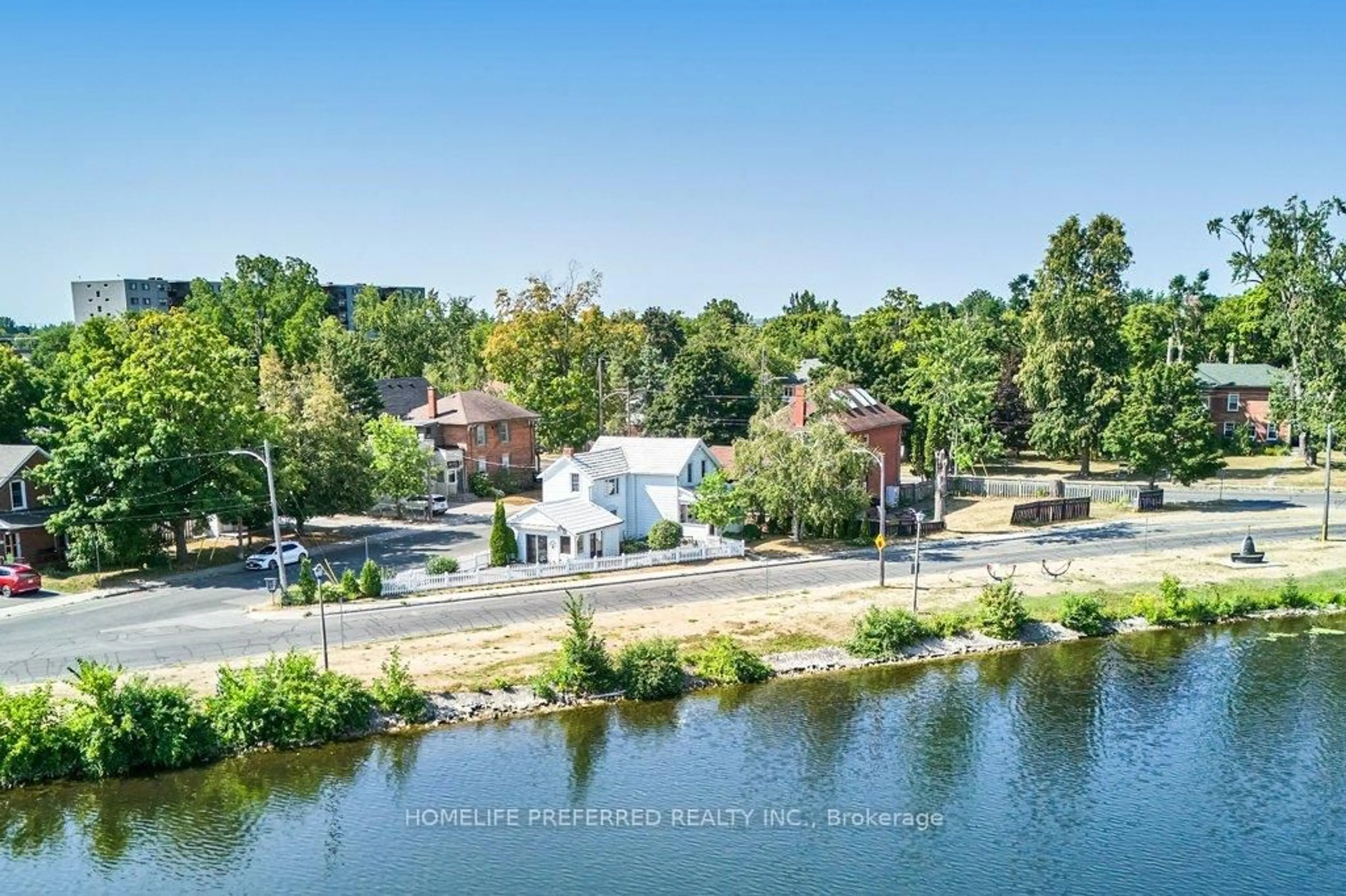 A pic from outside/outdoor area/front of a property/back of a property/a pic from drone, water/lake/river/ocean view for 157 Crescent St, Peterborough Central Ontario K9J 2G4