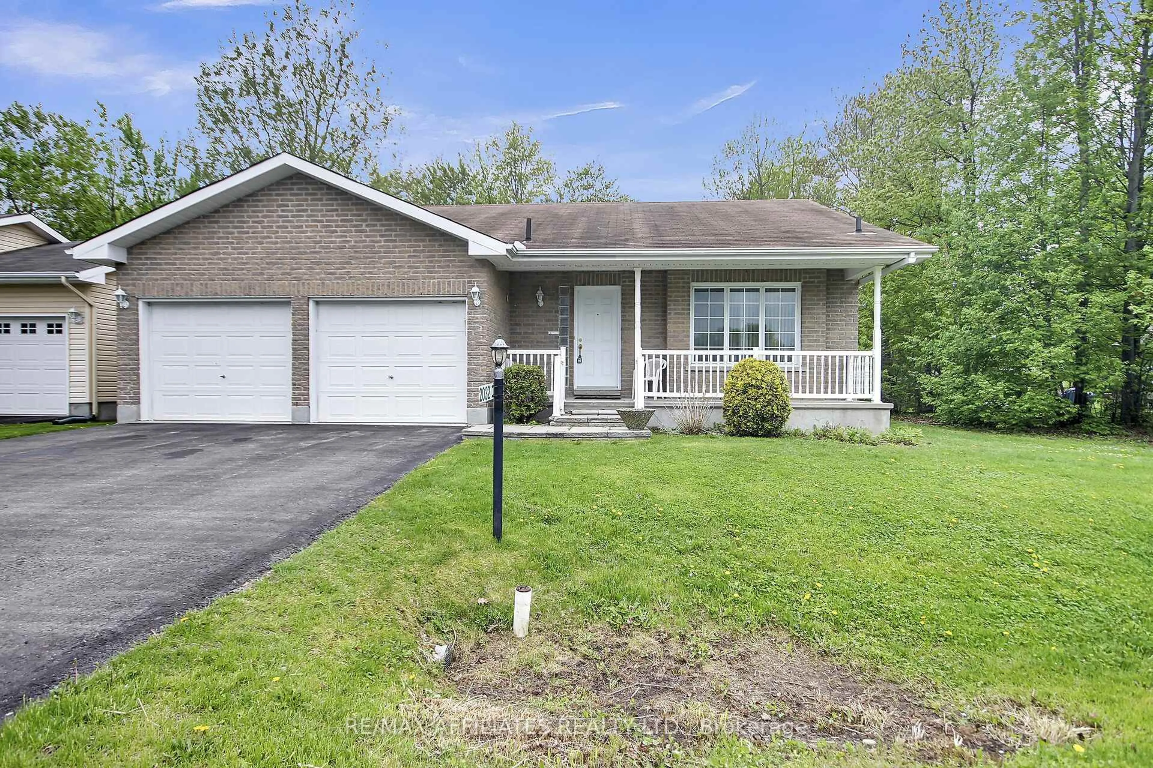 Home with brick exterior material, street for 2032 Sun Vista Private, Ottawa Ontario K4P 0A7
