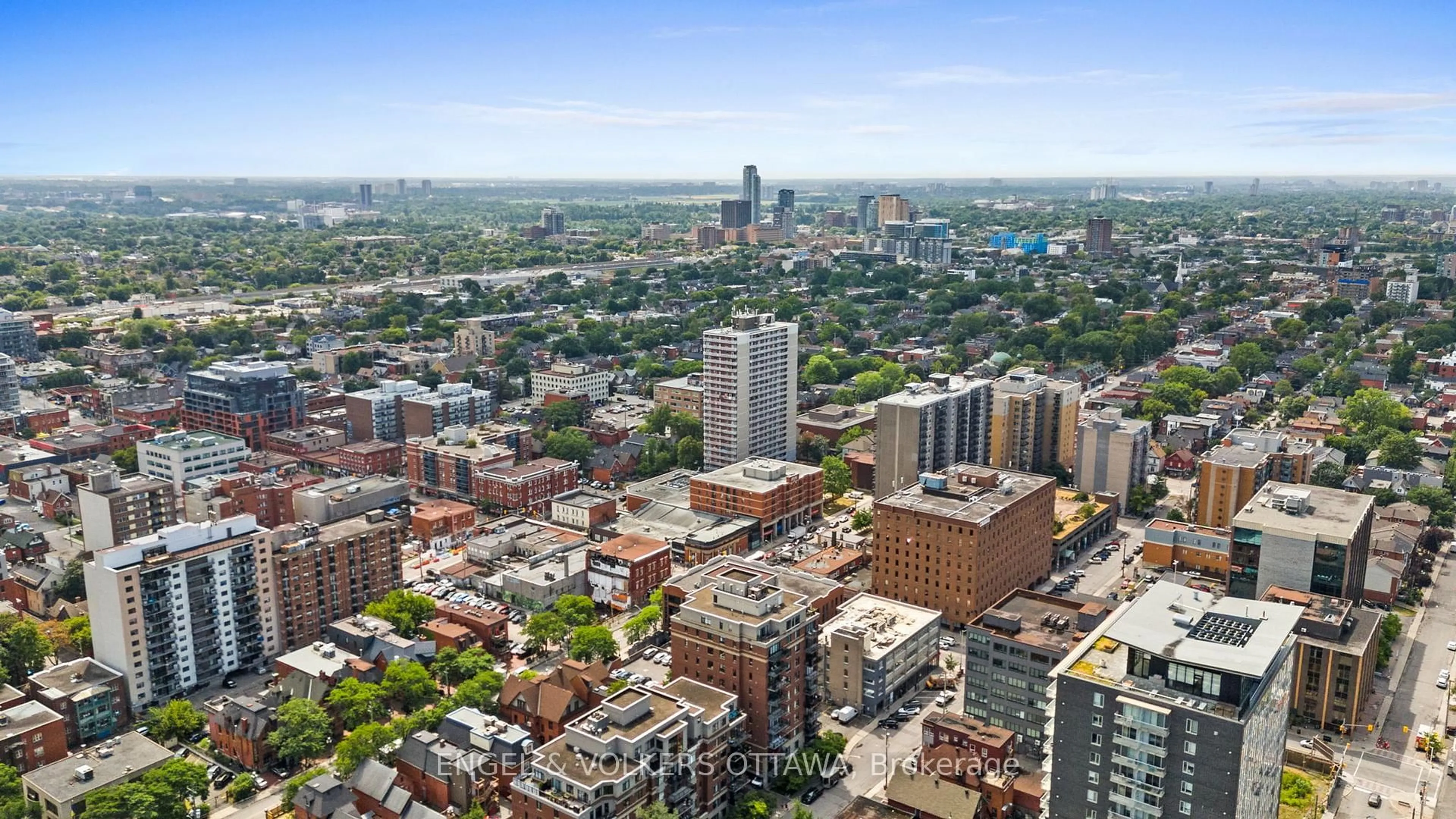 A pic from outside/outdoor area/front of a property/back of a property/a pic from drone, city buildings view from balcony for 374 Cooper St #703, Ottawa Ontario K2P 2P4