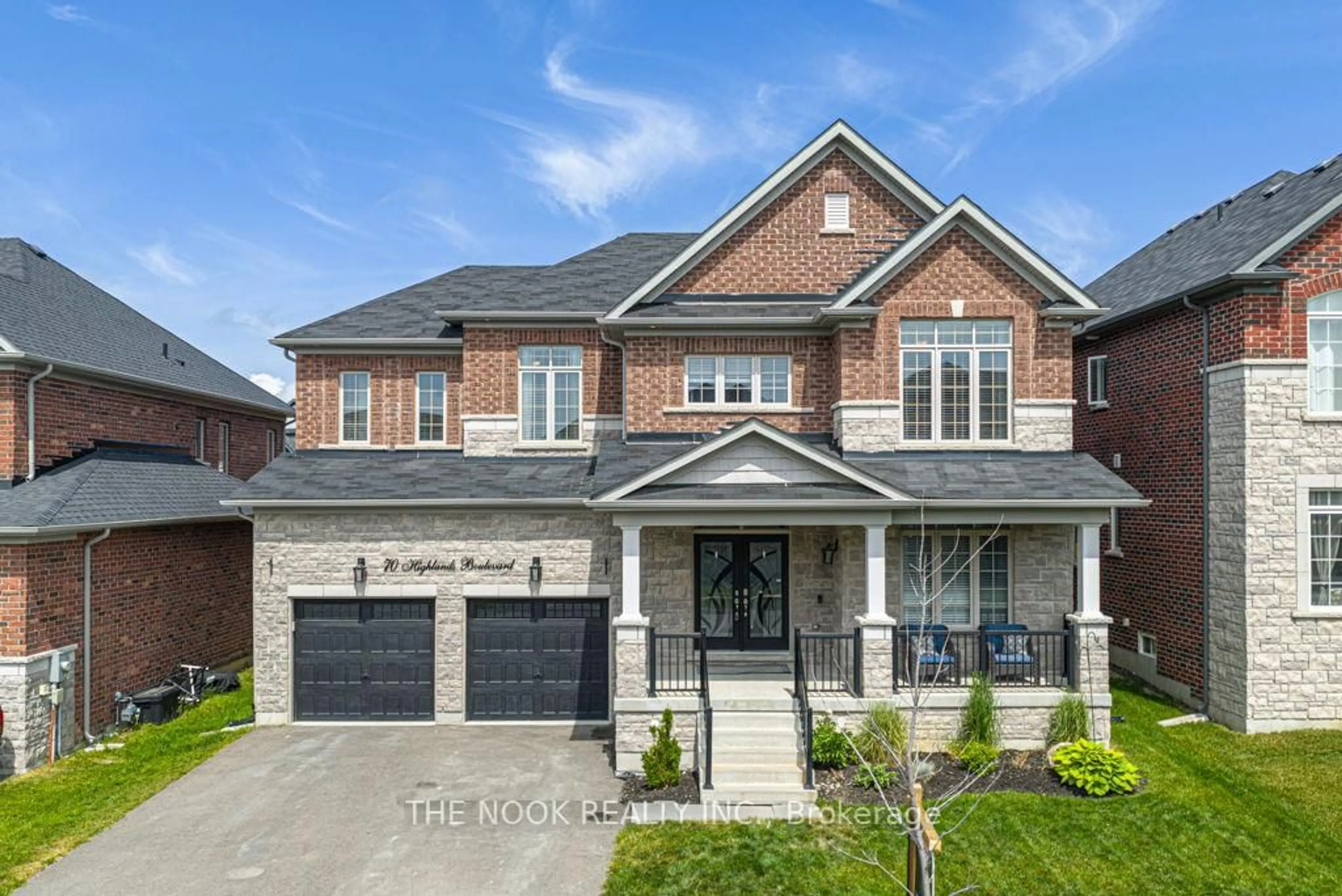 Home with brick exterior material, street for 70 Highlands Blvd, Cavan Monaghan Ontario L0A 1G0