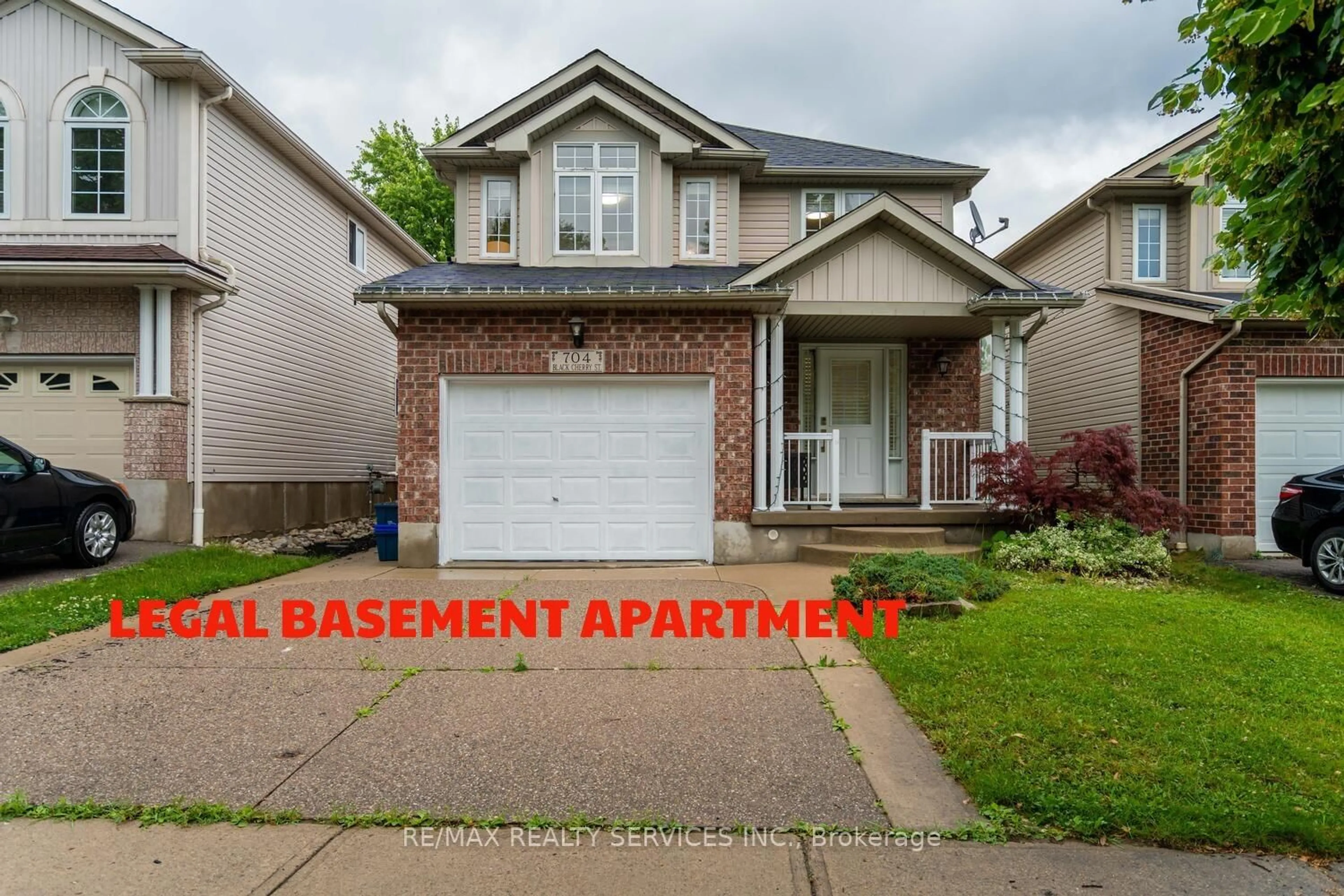 Home with vinyl exterior material, street for 704 Black Cherry St, Waterloo Ontario N2V 2P3