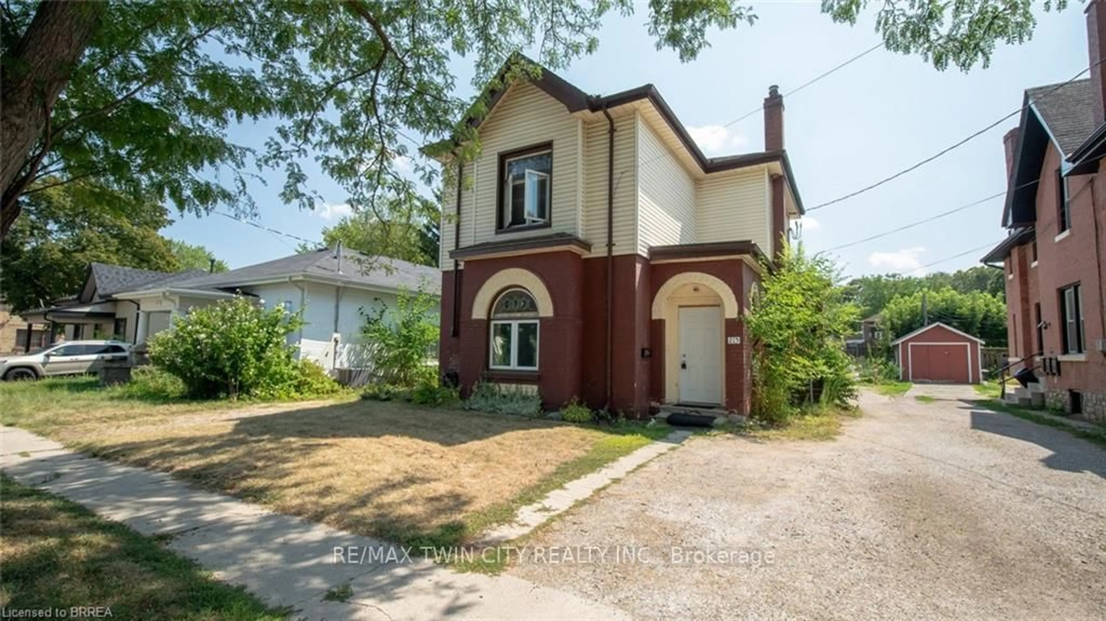 Home with brick exterior material, street for 215 NELSON St, Brantford Ontario N3S 4C5