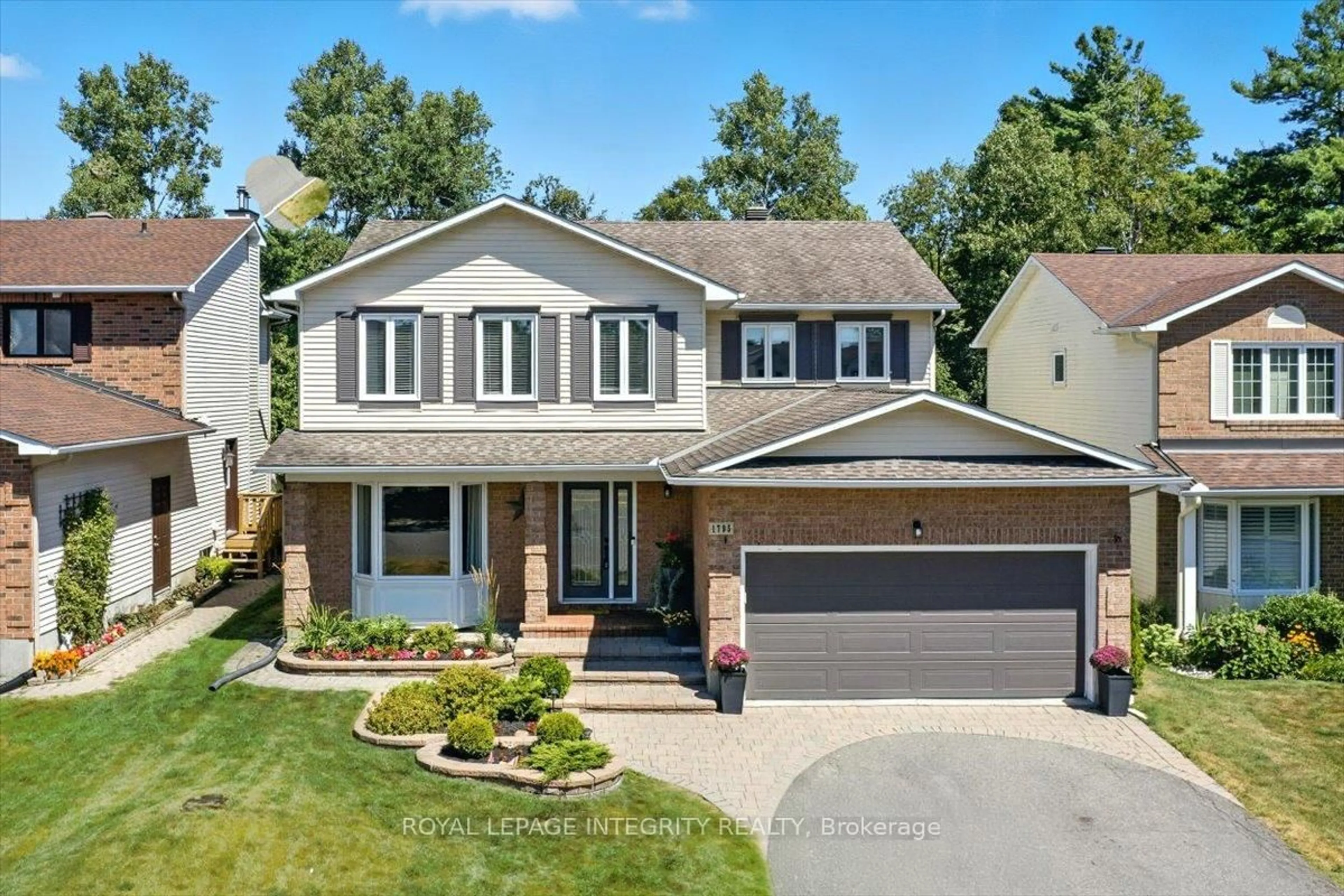 Home with vinyl exterior material, street for 1795 Turnberry Rd, Orleans Ontario K1E 3V1