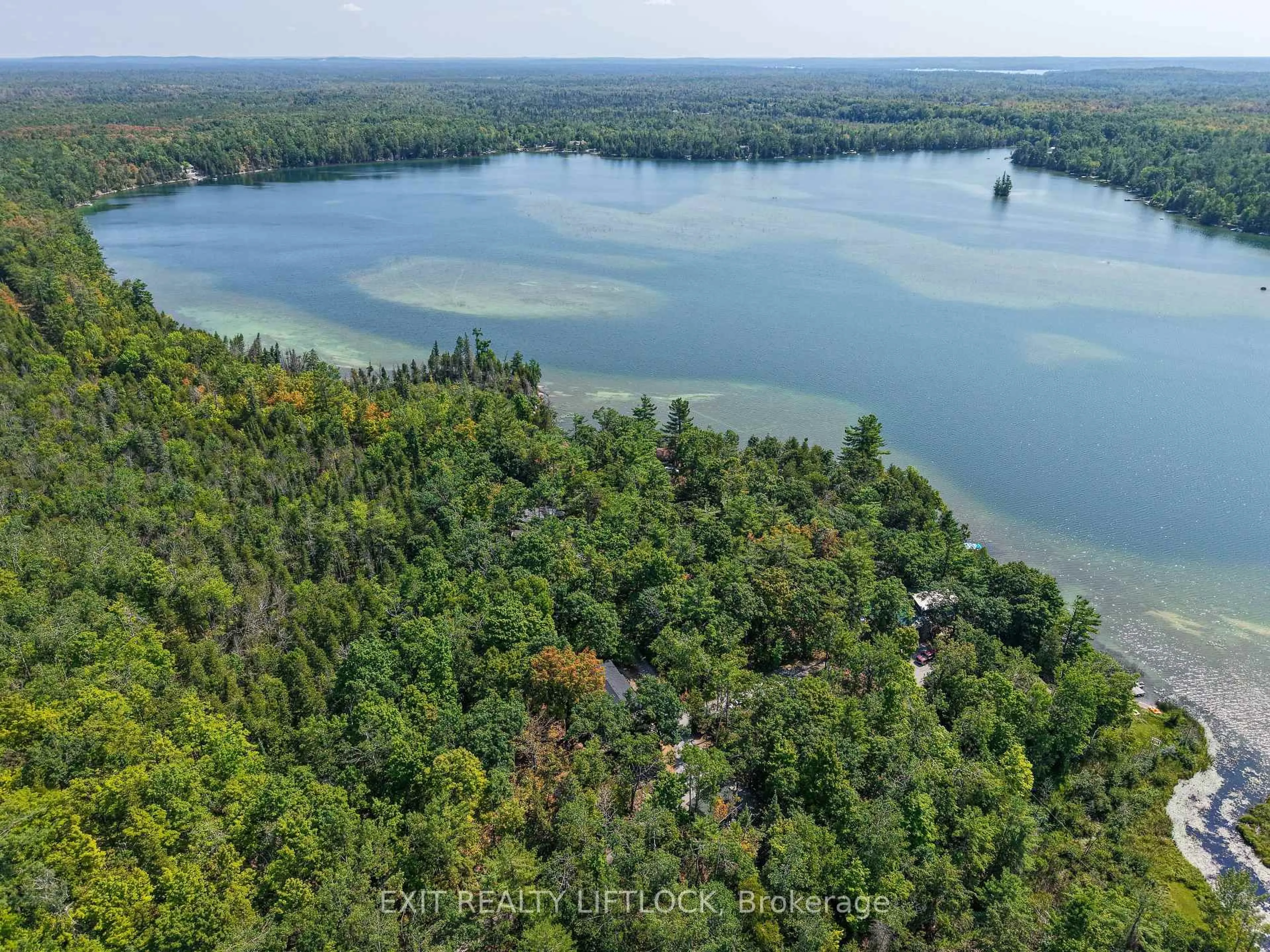 A pic from outside/outdoor area/front of a property/back of a property/a pic from drone, water/lake/river/ocean view for 41 Fire Route 37, North Kawartha Ontario K0L 3E0