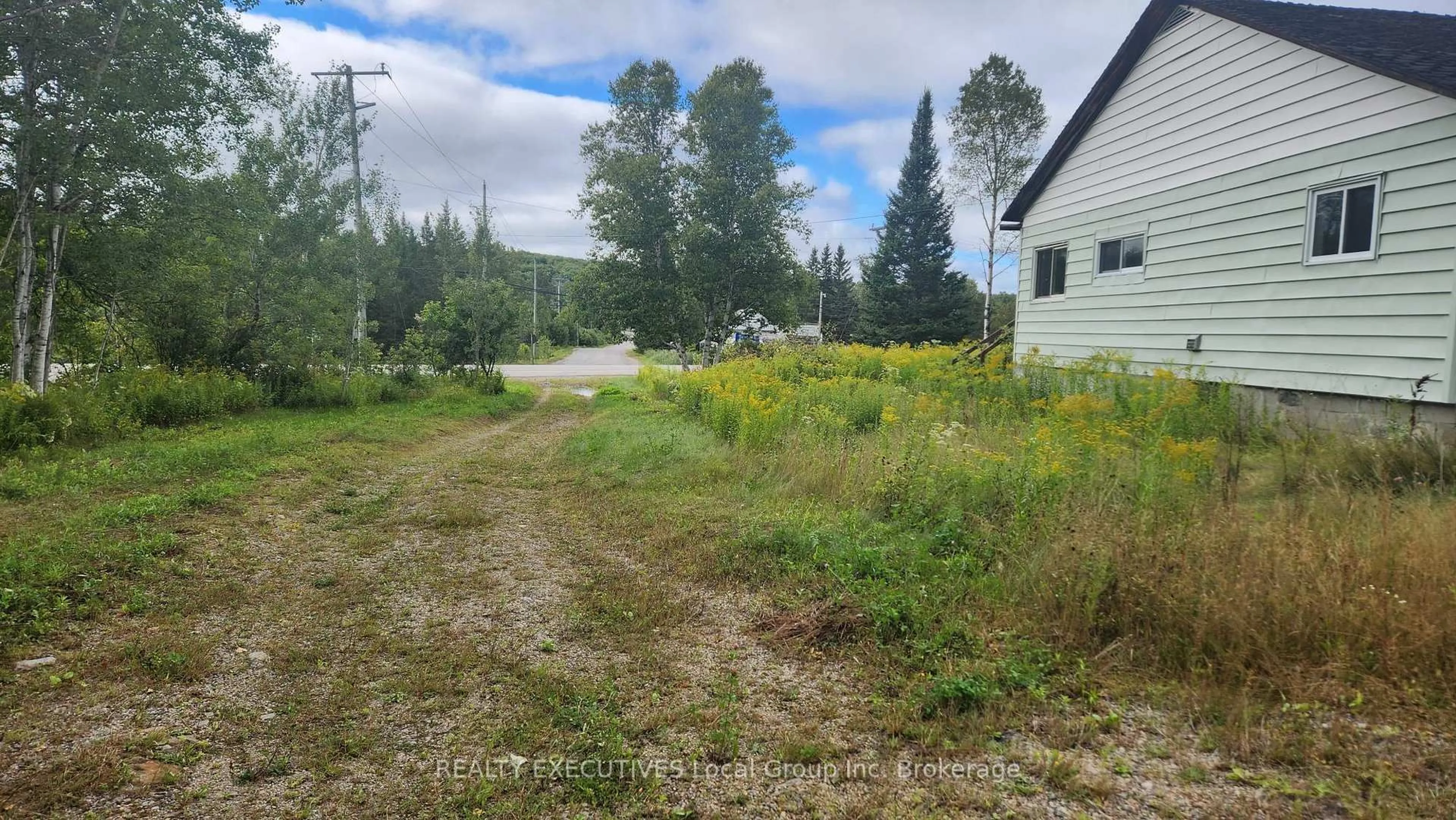 A pic from outside/outdoor area/front of a property/back of a property/a pic from drone, unknown for 8406 Highway 63, Unorganized Townships Ontario P1B 8G4