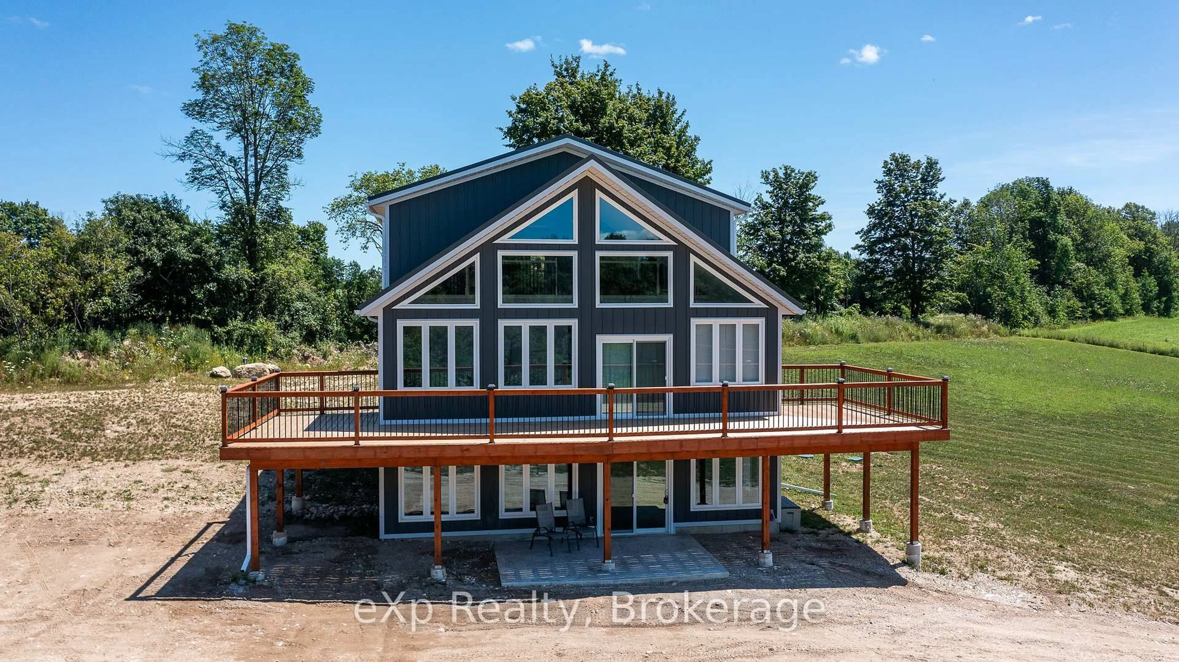 A pic from outside/outdoor area/front of a property/back of a property/a pic from drone, water/lake/river/ocean view for 315225 Hwy 6, Chatsworth Ontario N0H 2V0