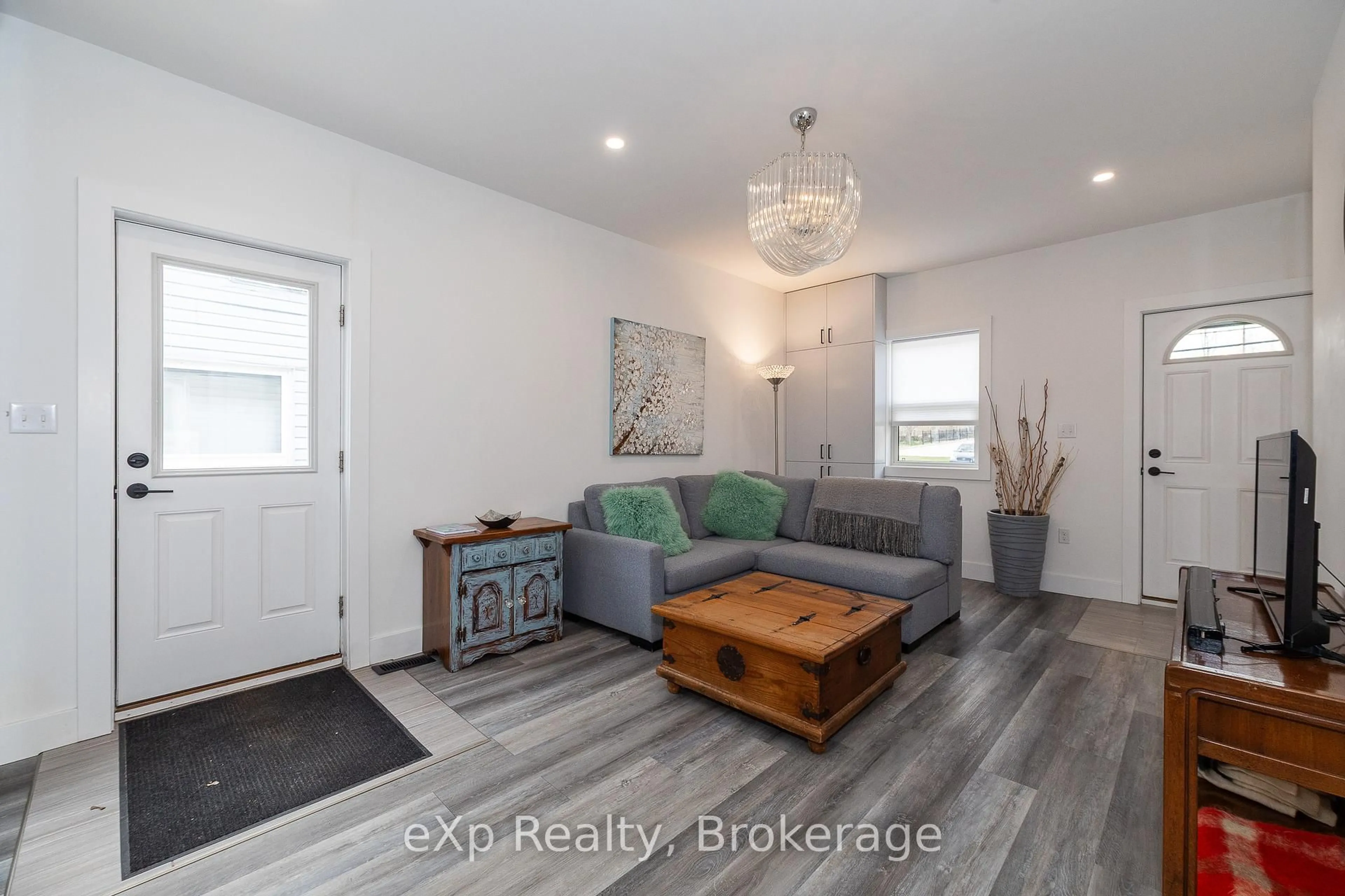Living room with furniture, wood/laminate floor for 360 Frank St, South Bruce Peninsula Ontario N0H 2T0
