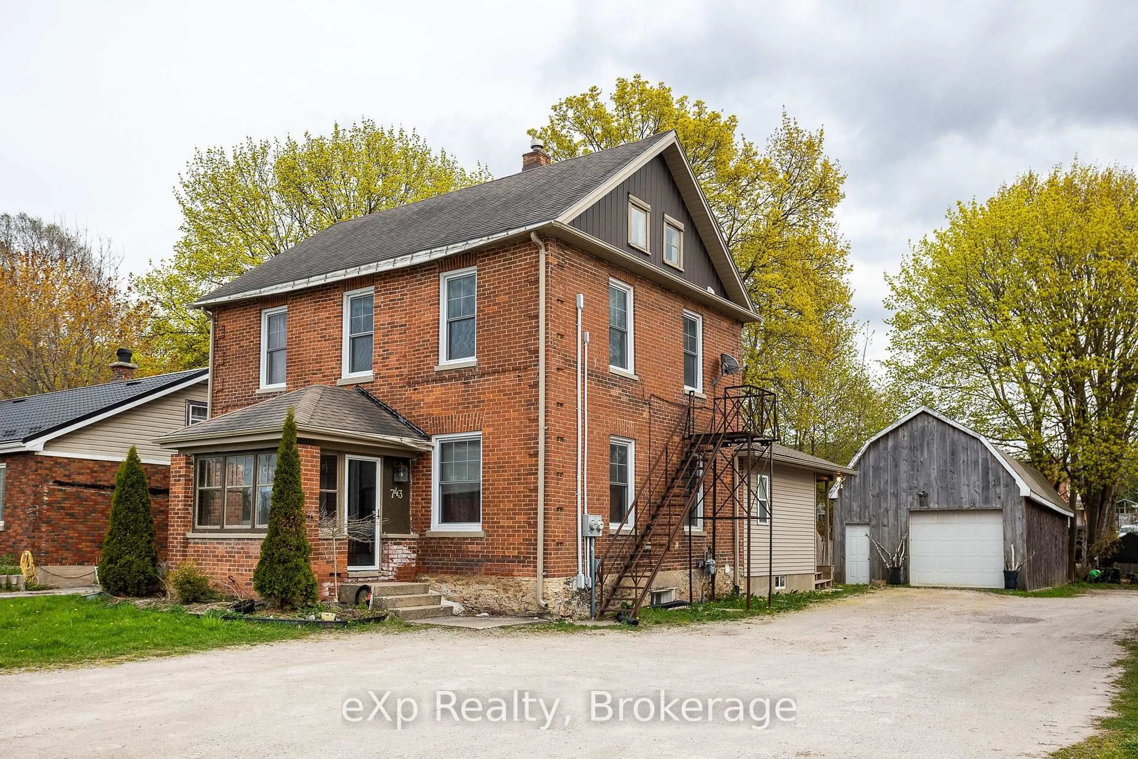 Home with brick exterior material, street for 743 10th St, Owen Sound Ontario N4K 1T2