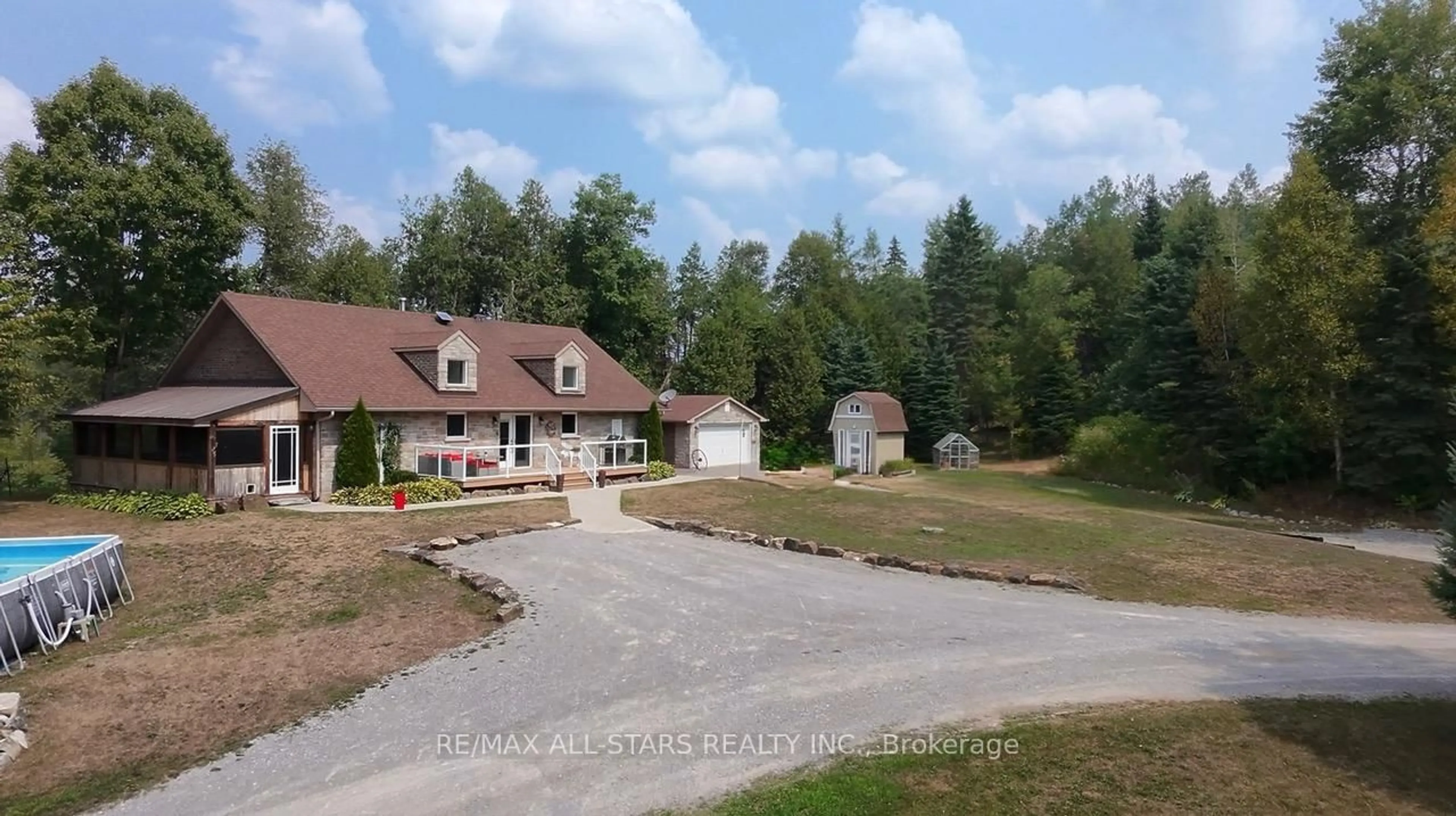 A pic from outside/outdoor area/front of a property/back of a property/a pic from drone, unknown for 728 Galway Rd, Trent Lakes Ontario K0M 2A0