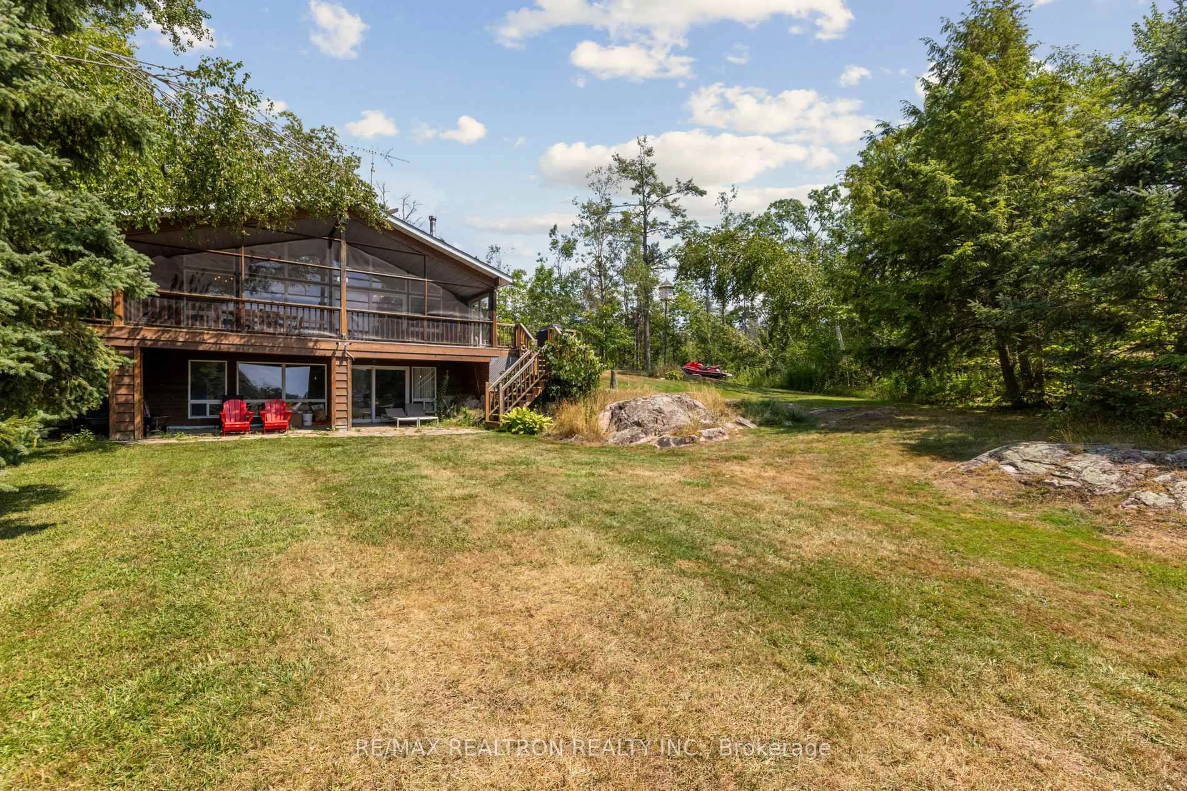A pic from outside/outdoor area/front of a property/back of a property/a pic from drone, water/lake/river/ocean view for 383 Philrick Dr, Trent Lakes Ontario K0L 1J0