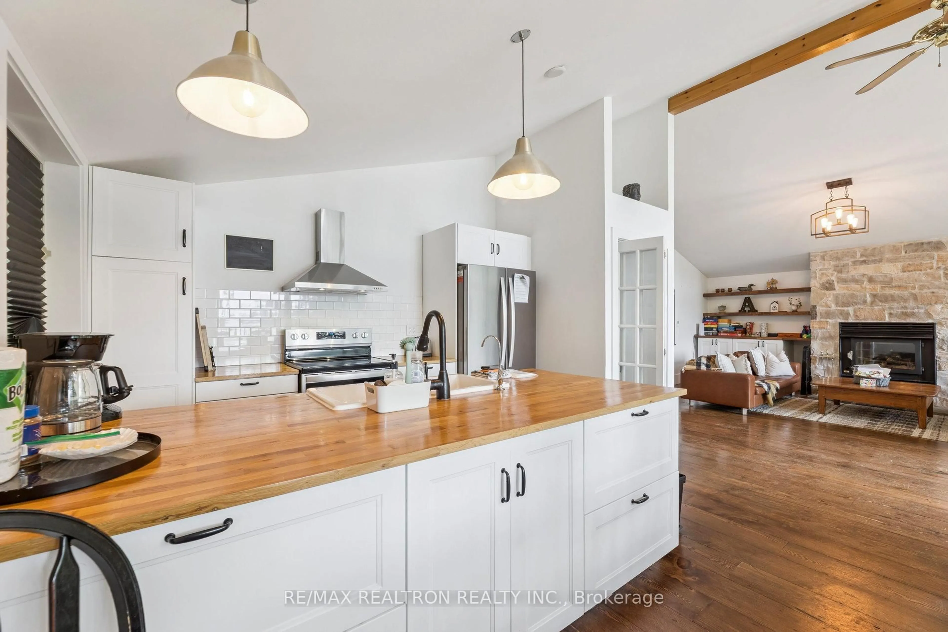 Open concept kitchen, wood/laminate floor for 383 Philrick Dr, Trent Lakes Ontario K0L 1J0
